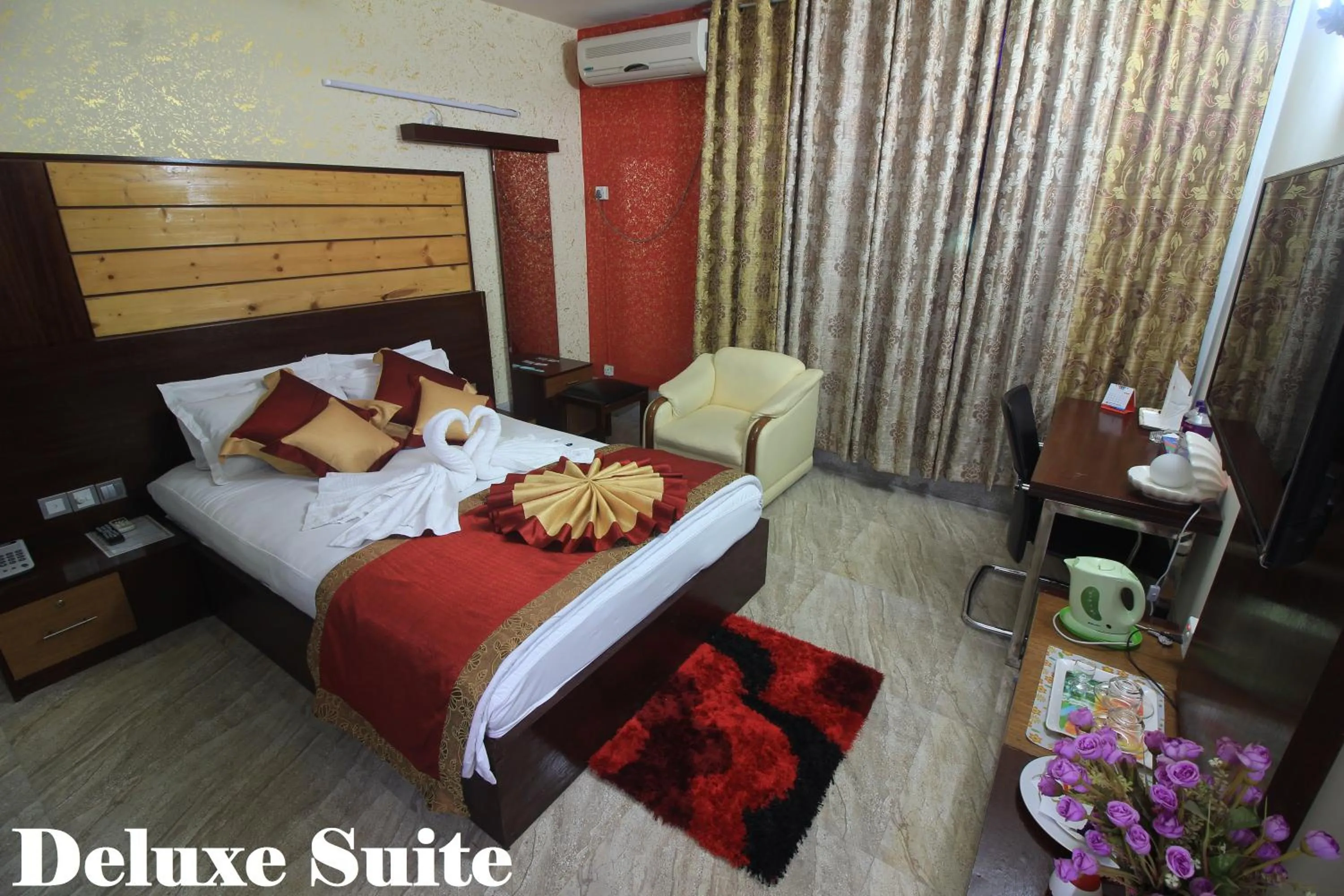 Bed in Tiger Garden Int Hotel