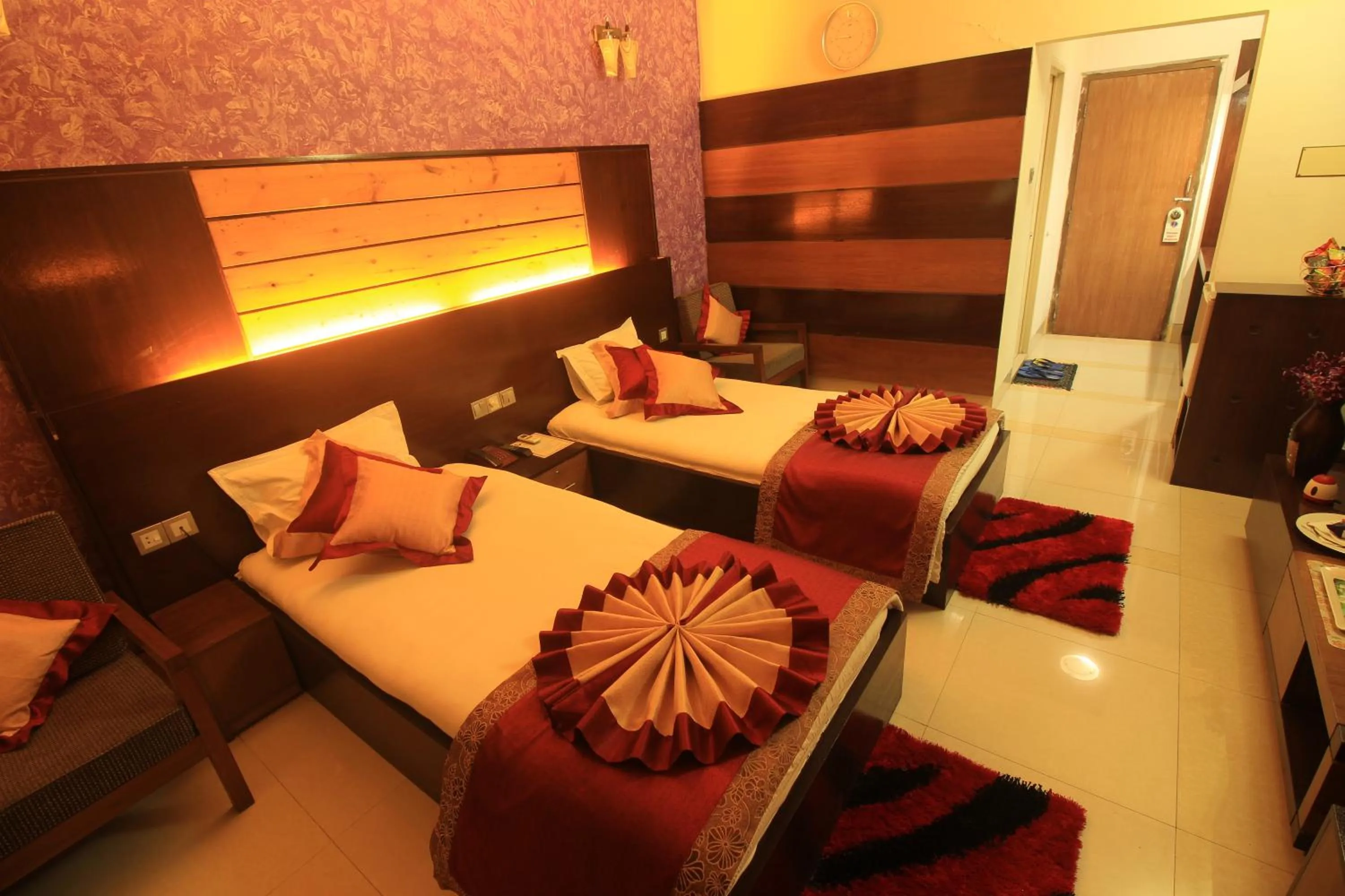 Bed in Tiger Garden Int Hotel