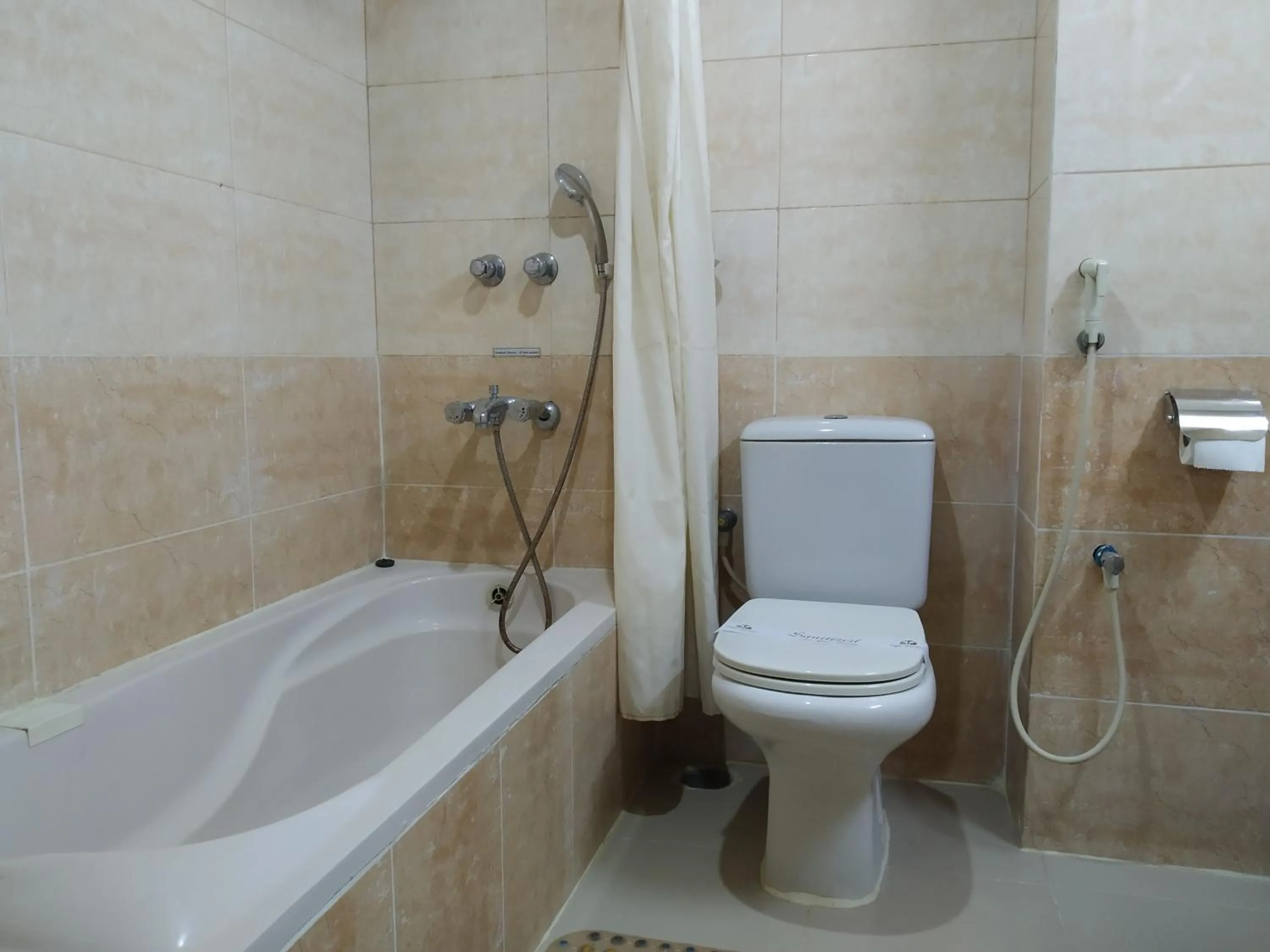 Toilet in Tiger Garden Int Hotel