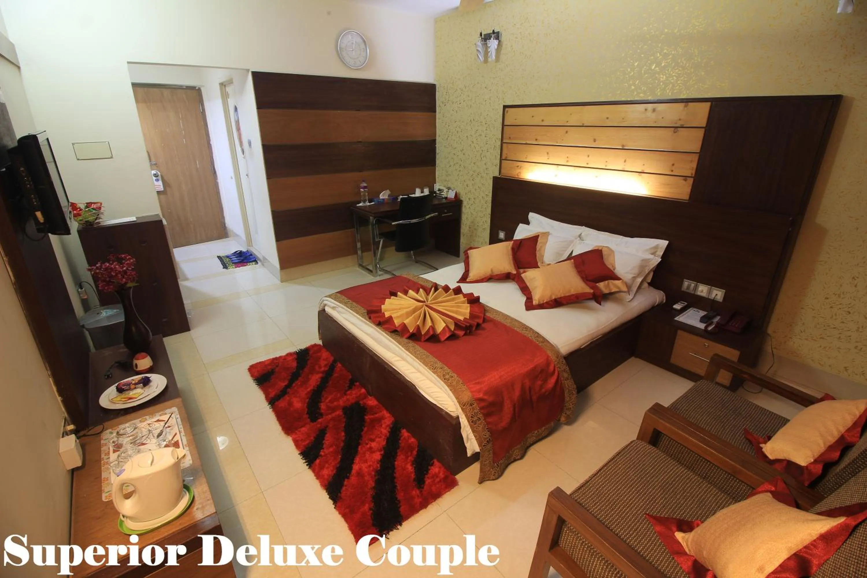 Bed in Tiger Garden Int Hotel