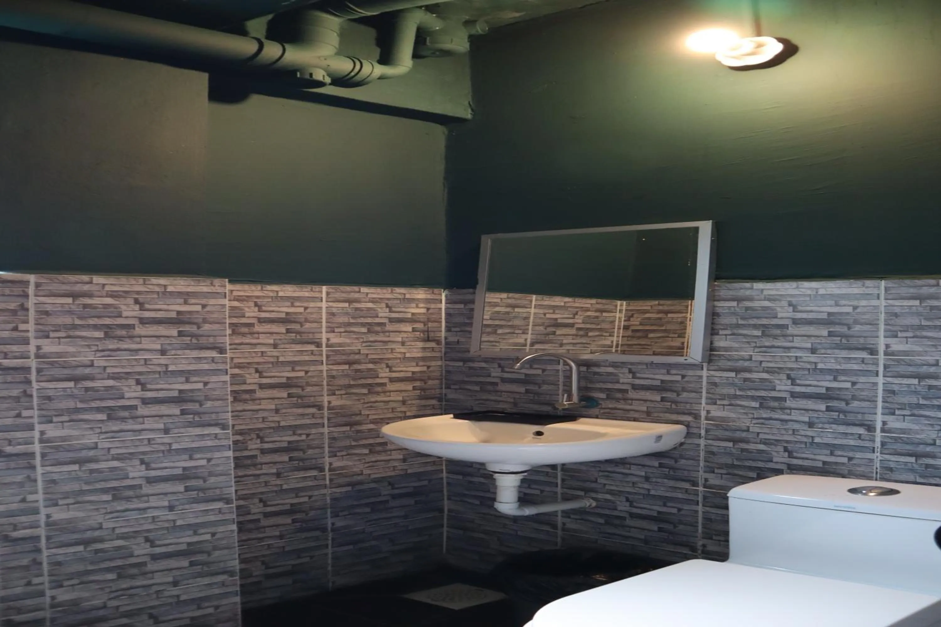 Bathroom in Room V at Kluang Parade Near Bus Stop Kluang