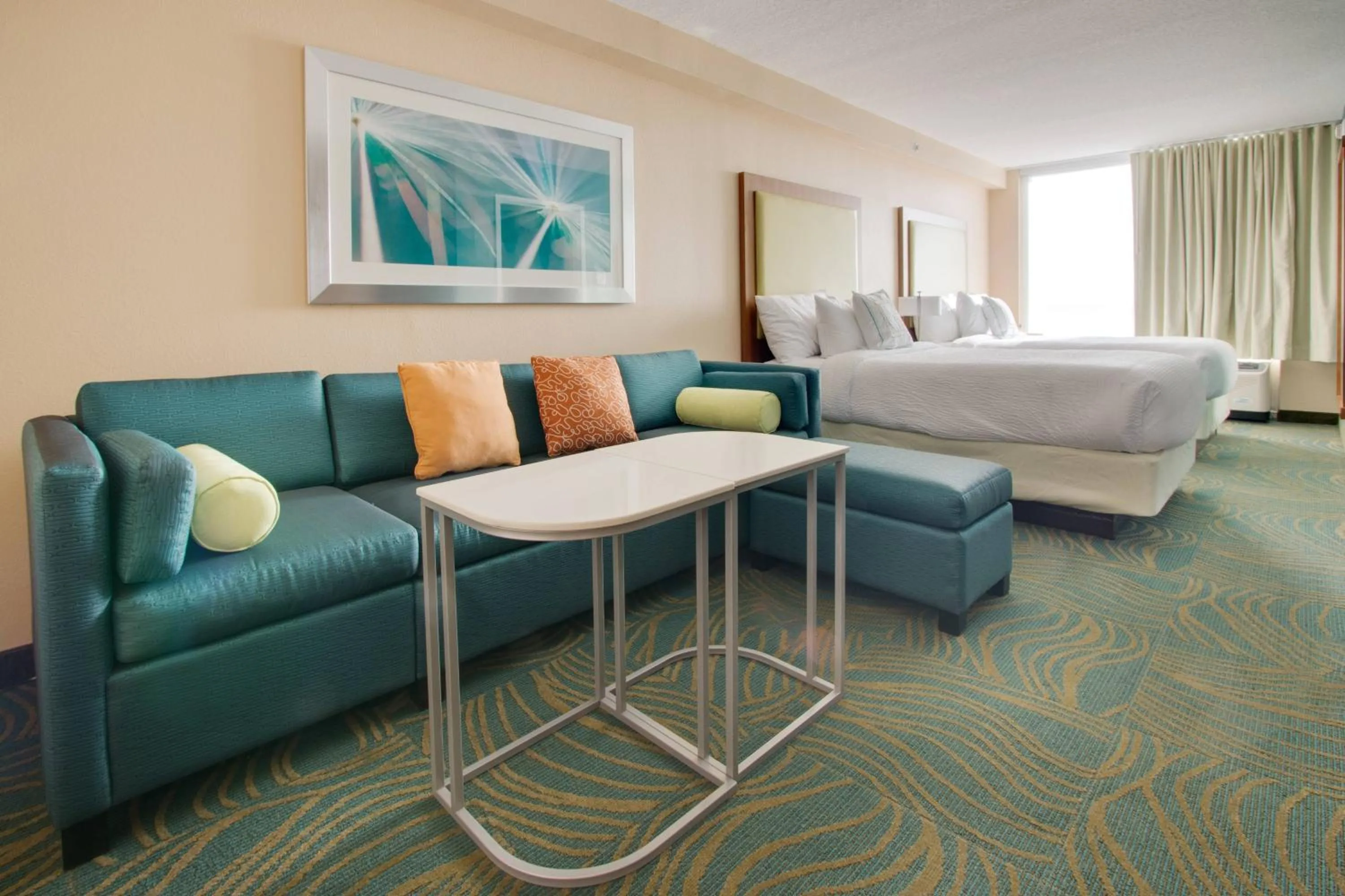 Living room, Bed in SpringHill Suites by Marriott Orlando Lake Buena Vista South
