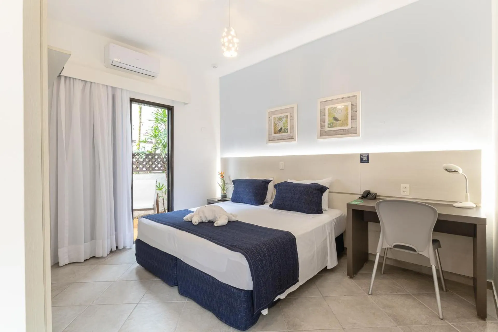 Bed in Hotel Ilhas da Grécia