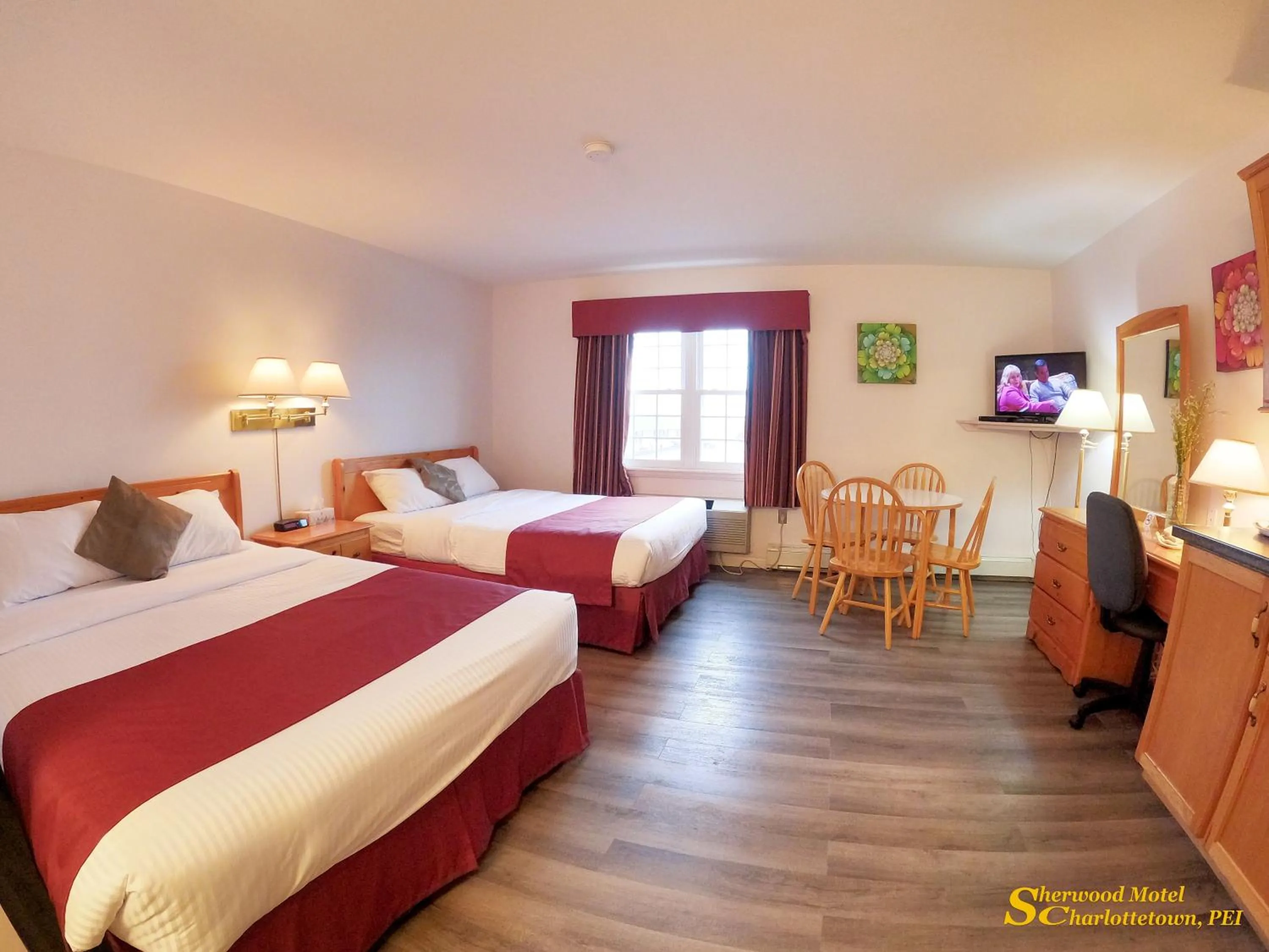 Bed in Sherwood Inn and Motel Charlottetown