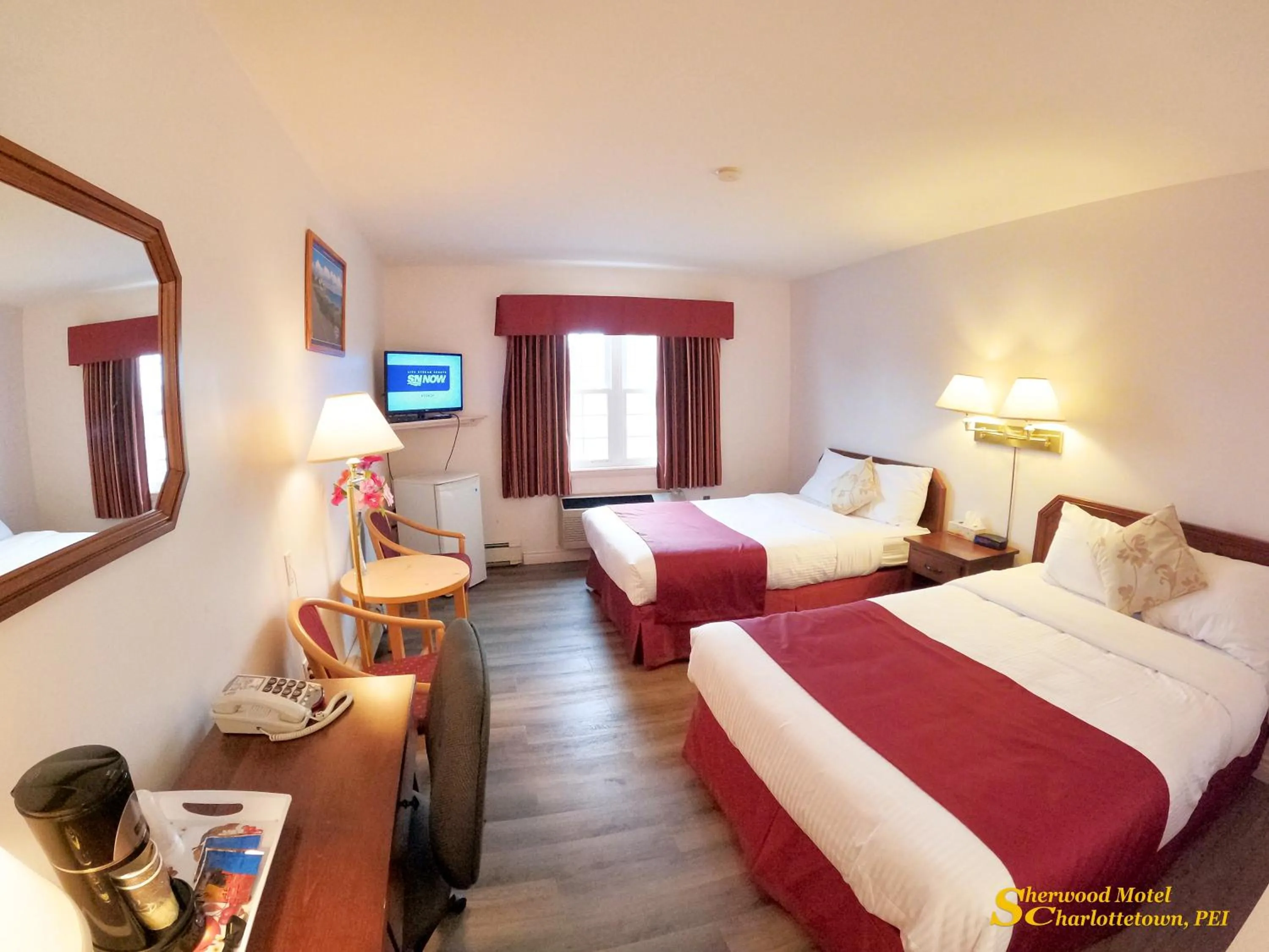 Bed in Sherwood Inn and Motel Charlottetown