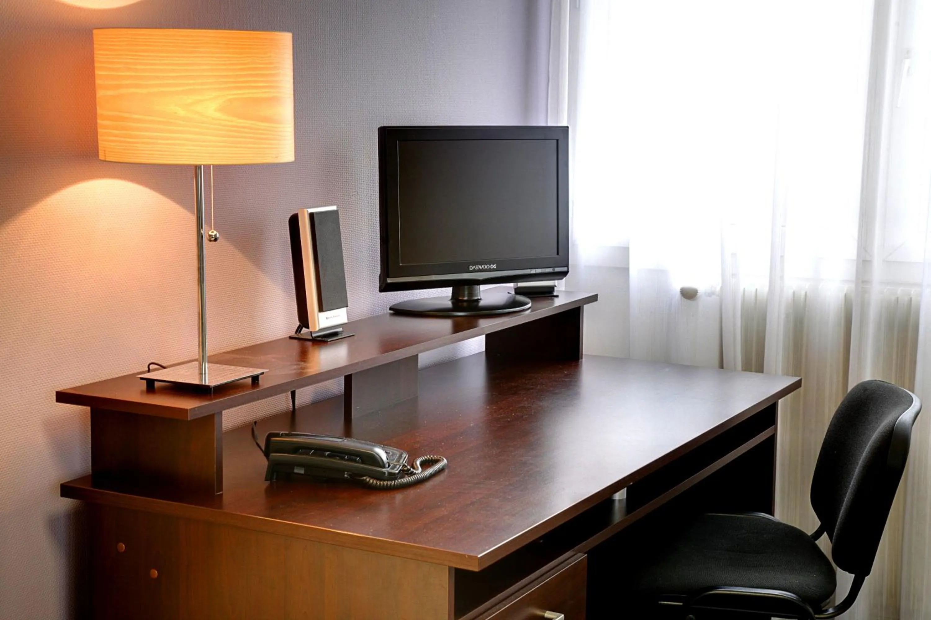 Seating area in KOSY Appart'Hôtels - Le Cours Moreau