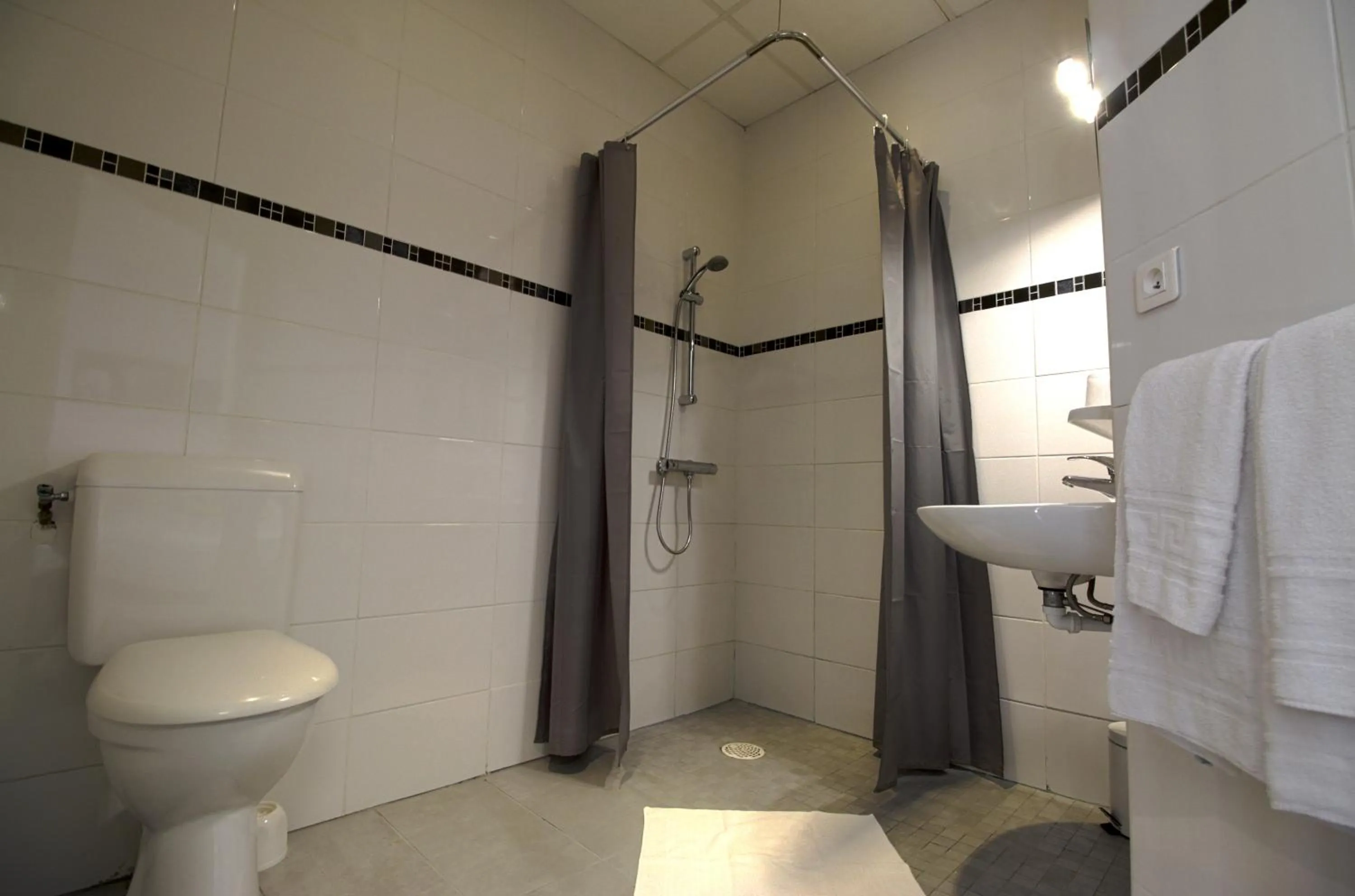 Bathroom in KOSY Appart'Hôtels - Le Cours Moreau