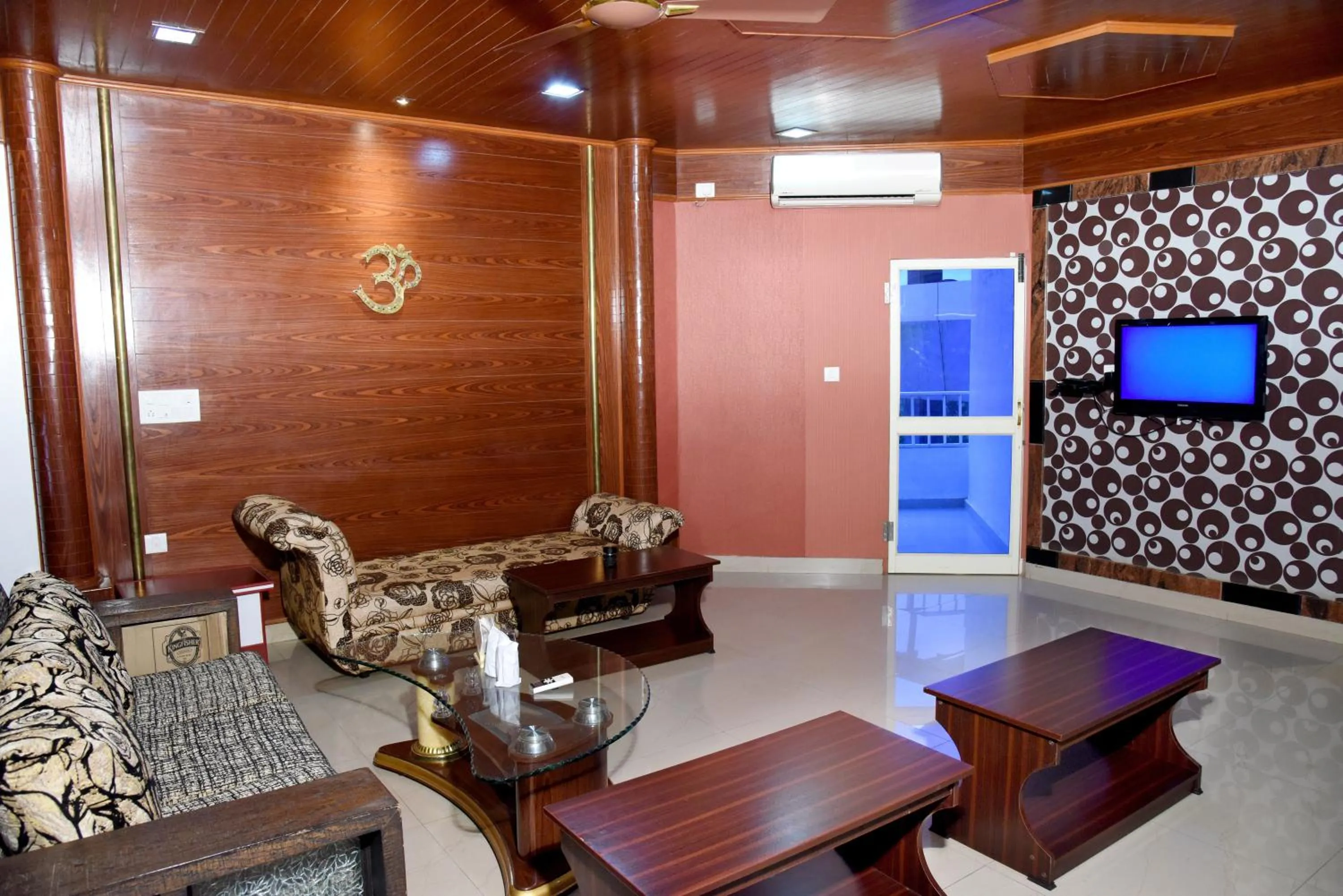 Living room in Hotel Sharada International
