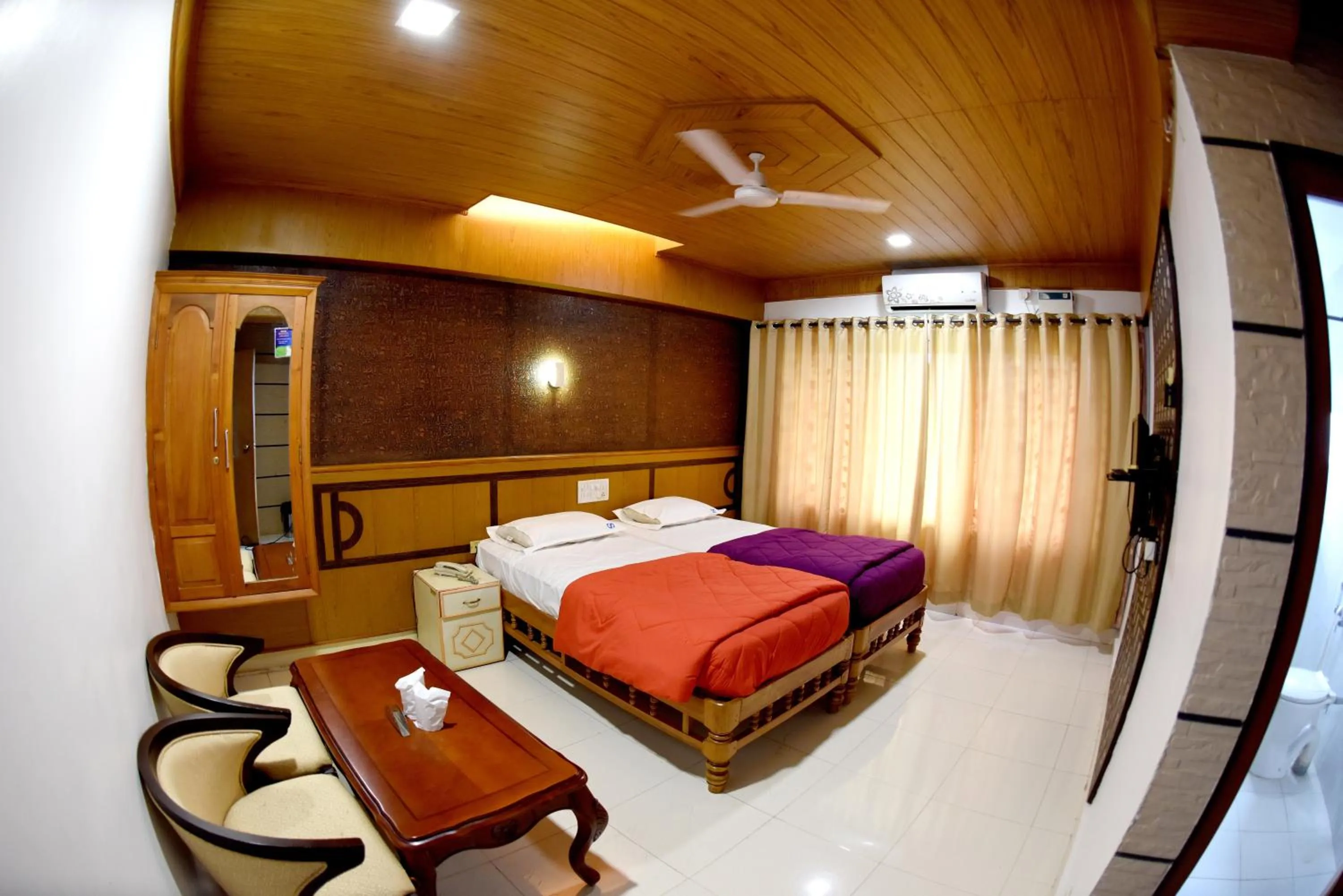 Bedroom, Bed in Hotel Sharada International