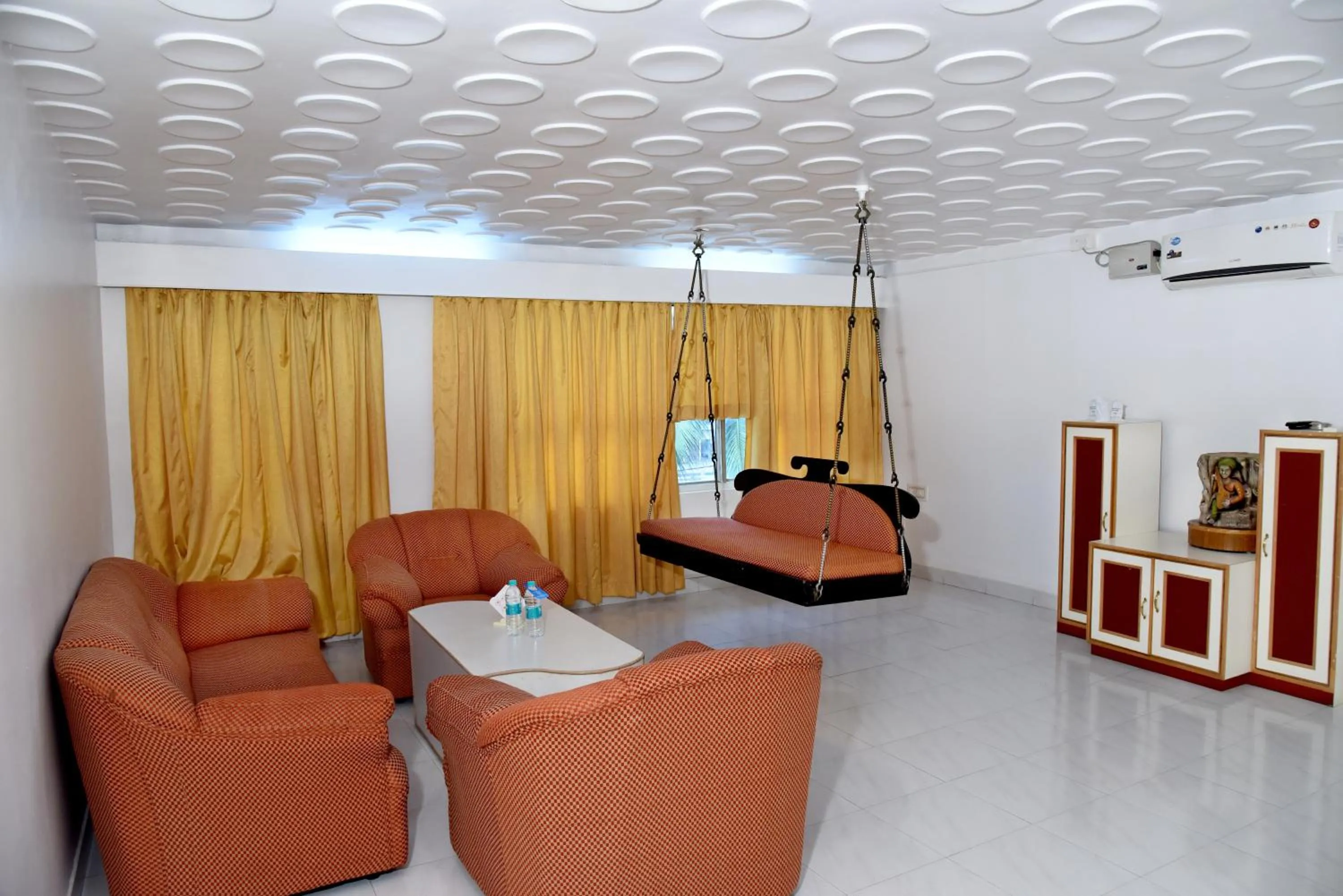 Seating area in Hotel Sharada International