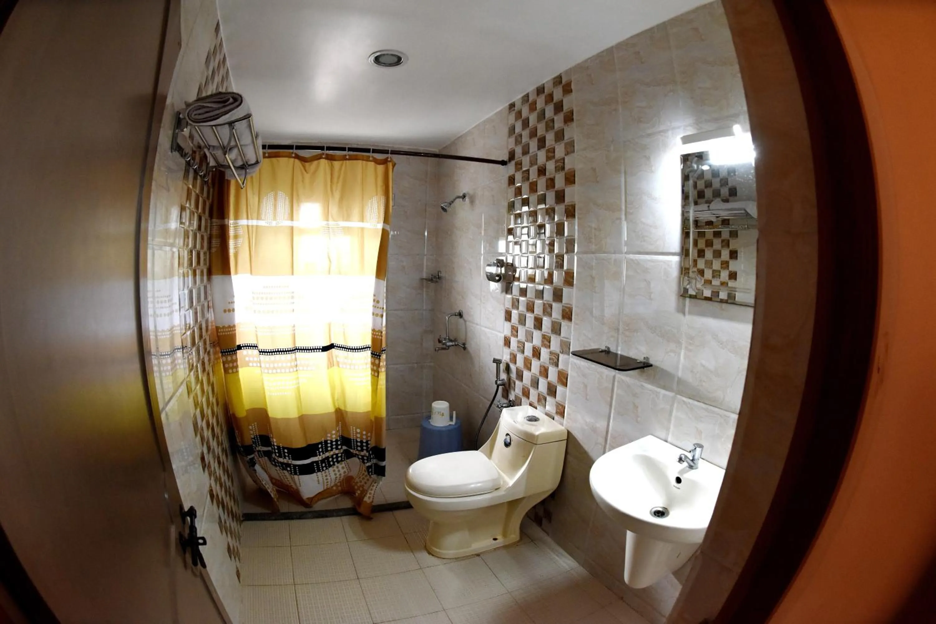 Bathroom in Hotel Sharada International