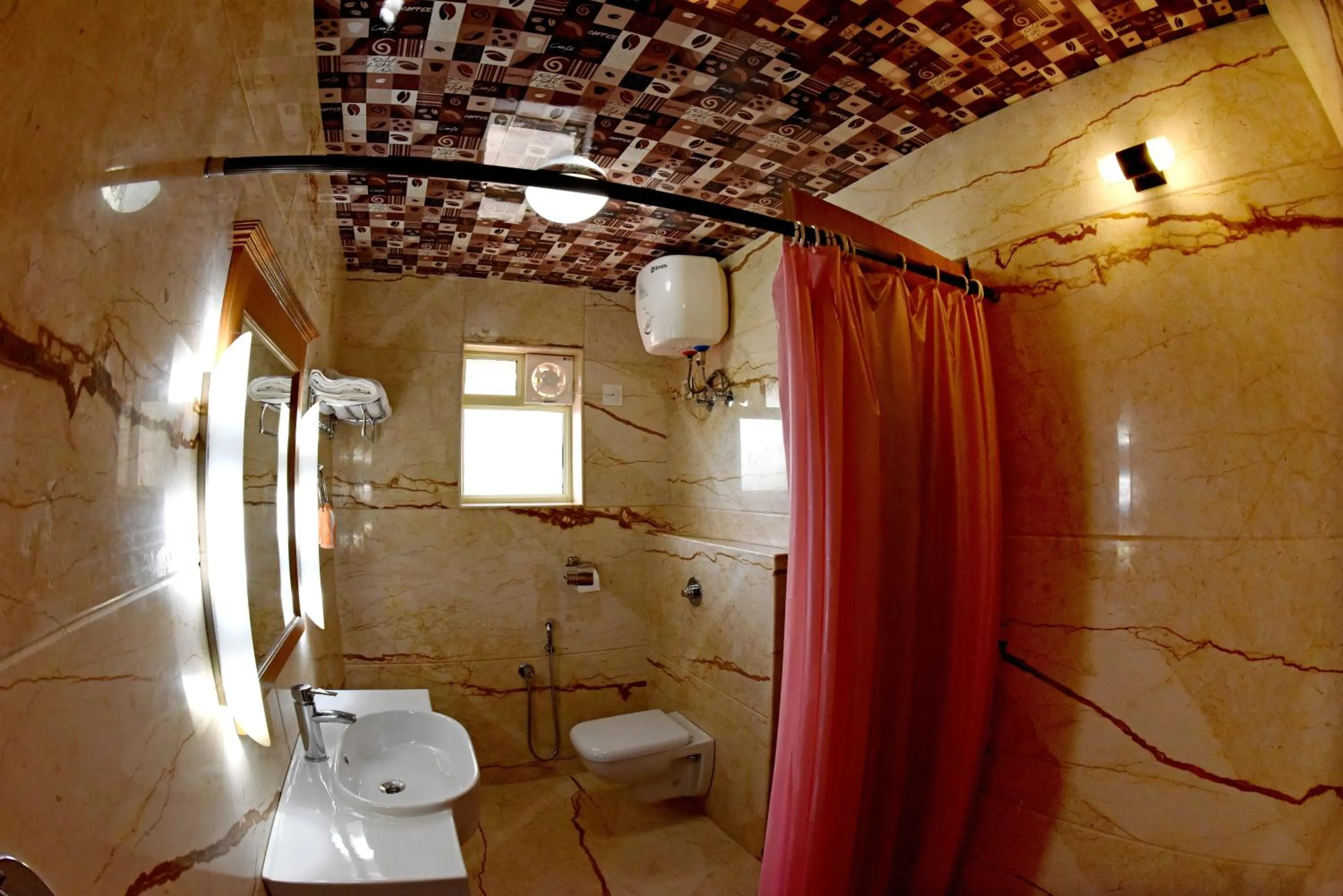 Bedroom in Hotel Sharada International