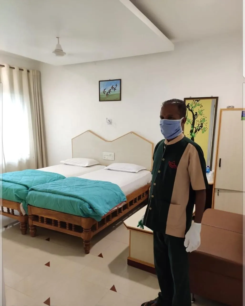 Bed in Hotel Sharada International