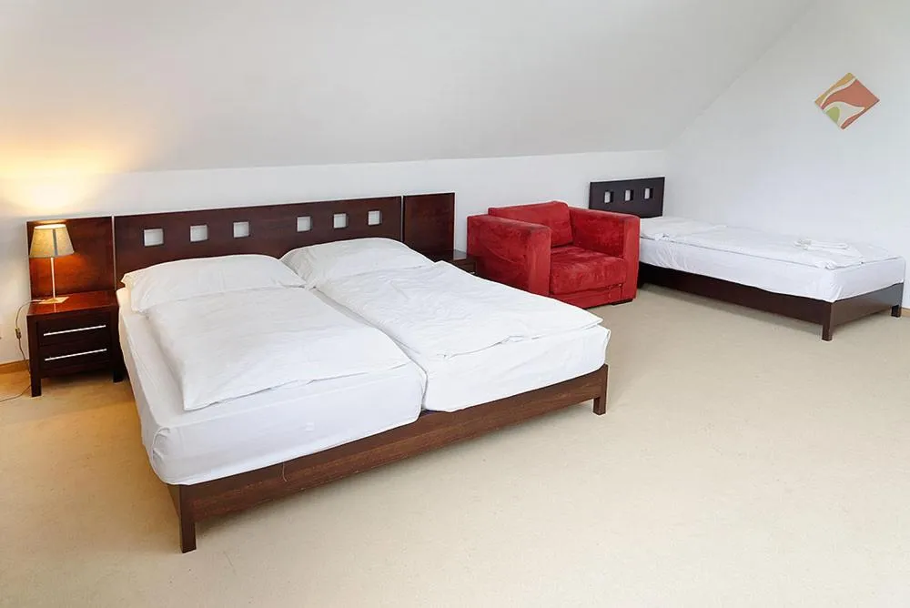 Bed in Hotel Tulipan