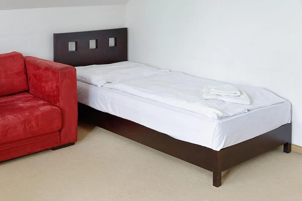 Bed in Hotel Tulipan