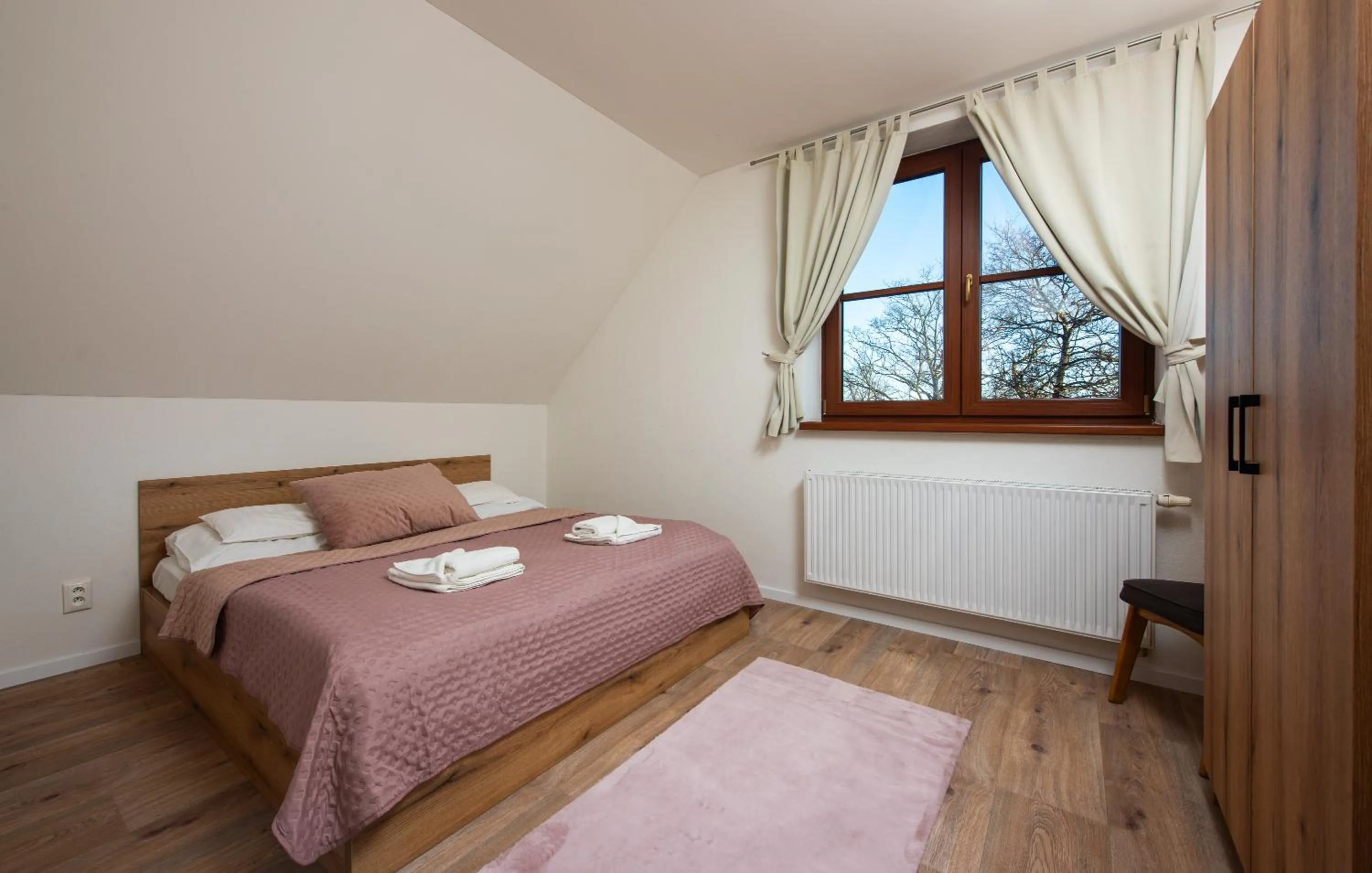 Bed in Hotel Tulipan