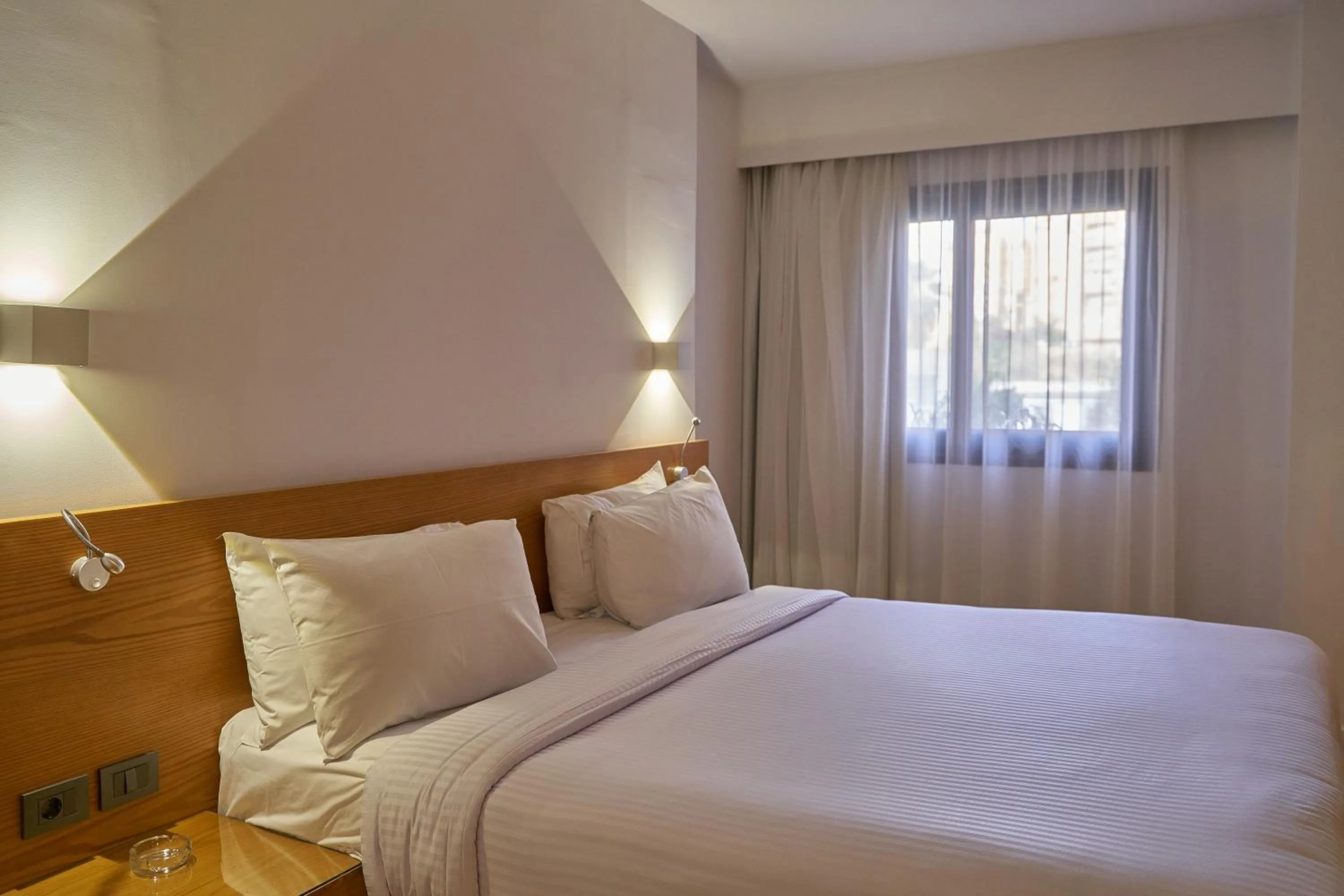 Bed in New President Hotel Cairo