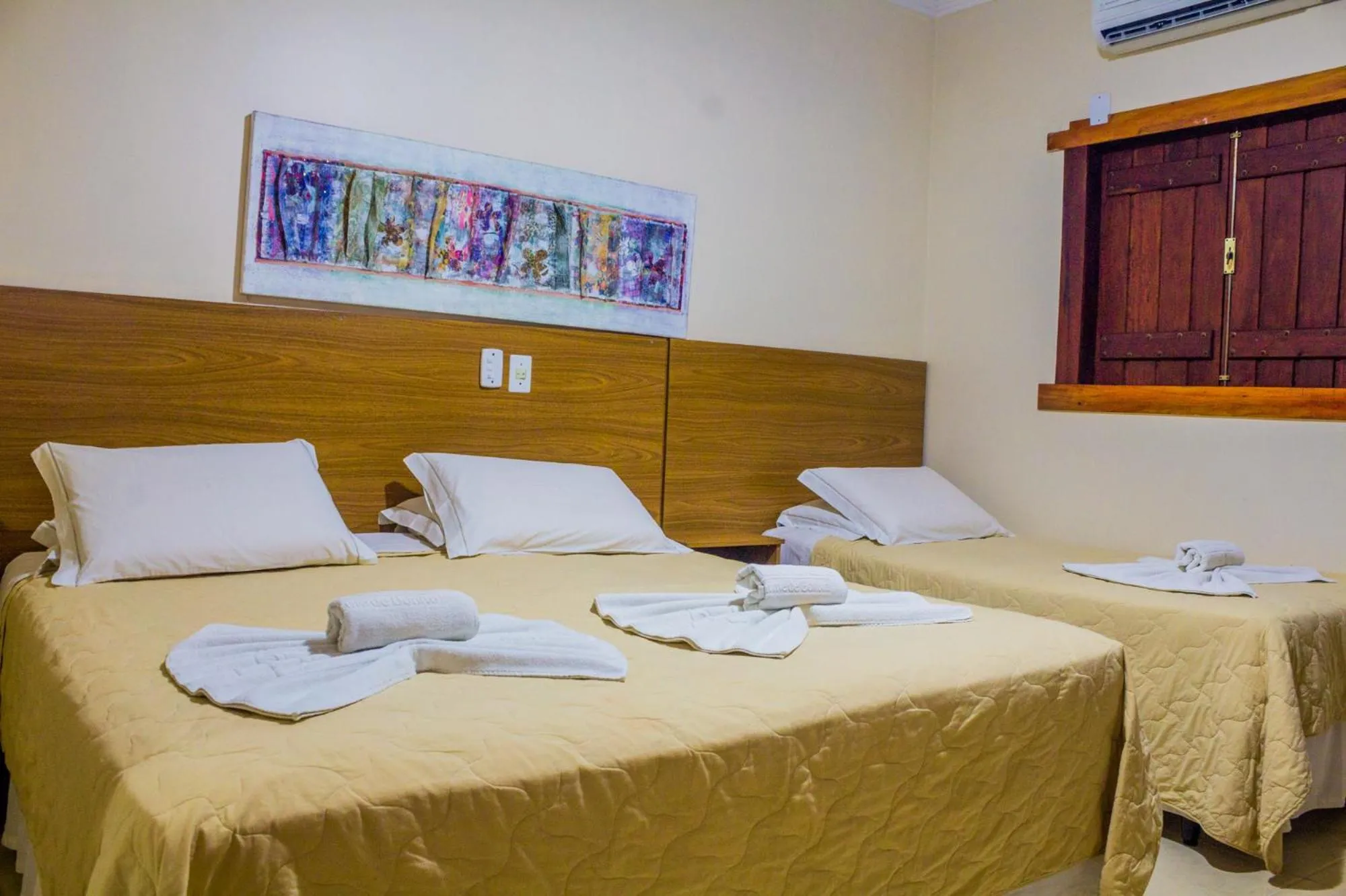 Bed in Pousada Chamamé