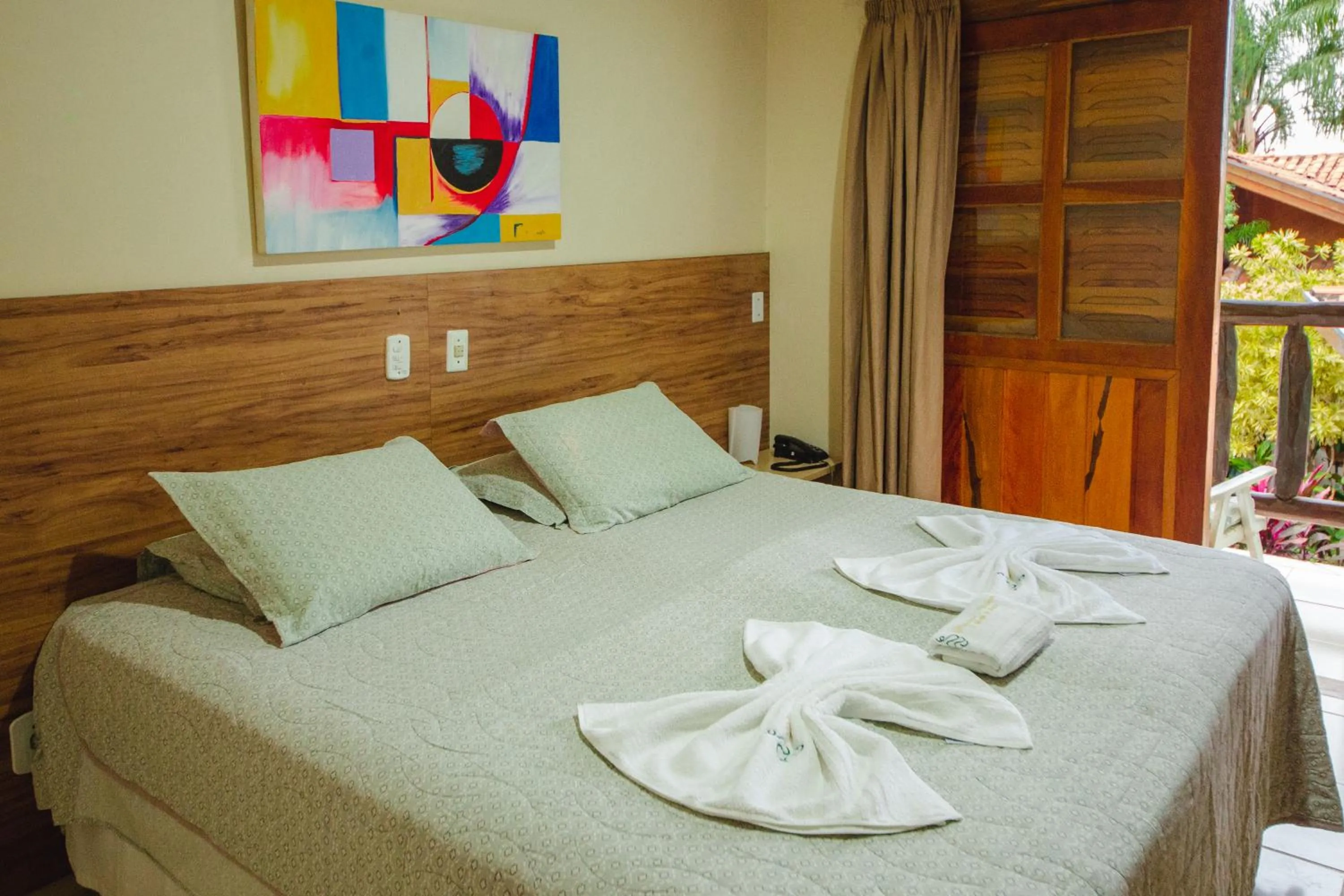 Bed in Pousada Chamamé