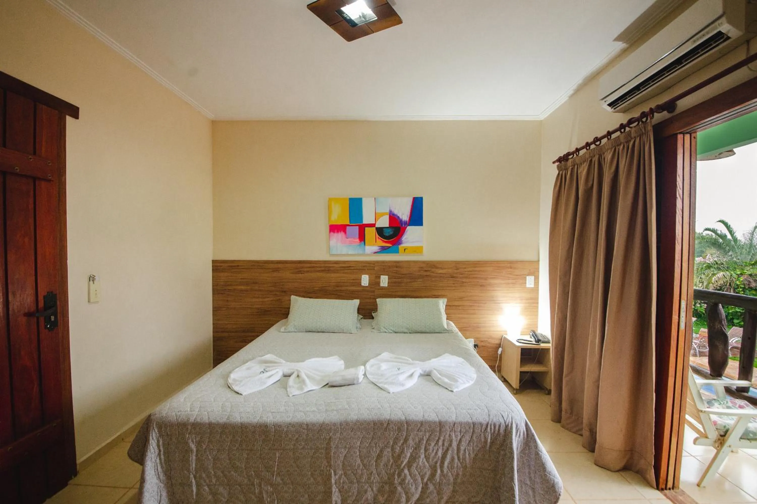 Photo of the whole room, Bed in Pousada Chamamé