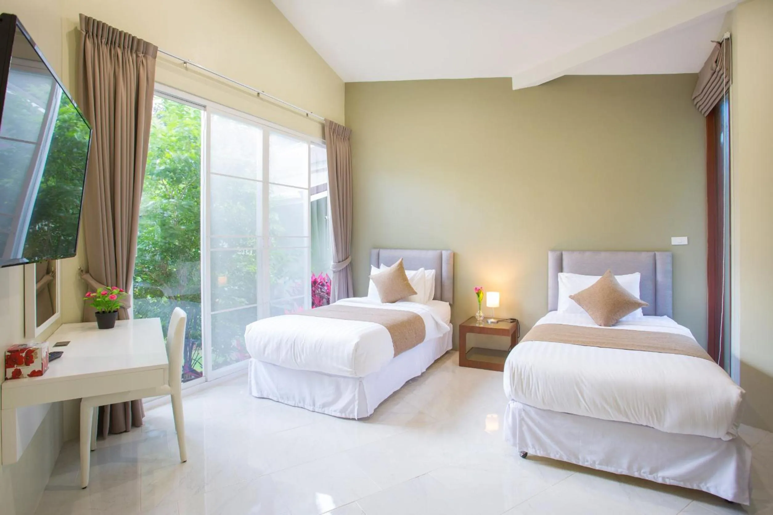 Bed in Arantarakiri Resort Khao Yai
