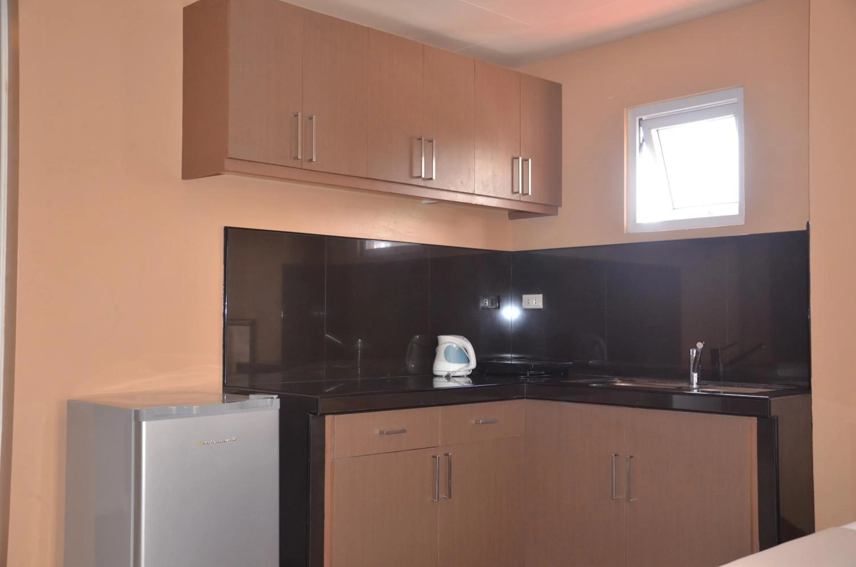 Kitchen or kitchenette in RL Veranda Suite