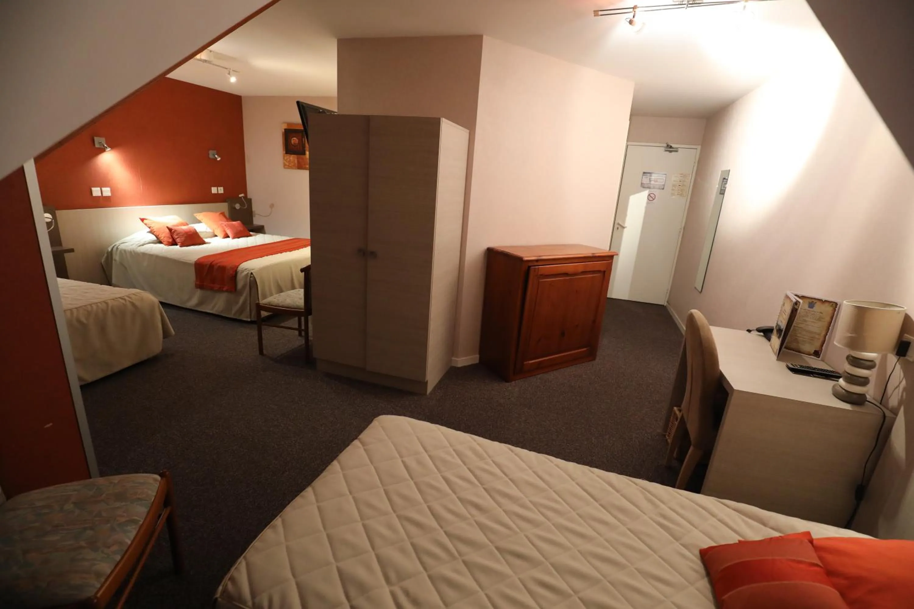 Bed in Logis Le Bourguignon