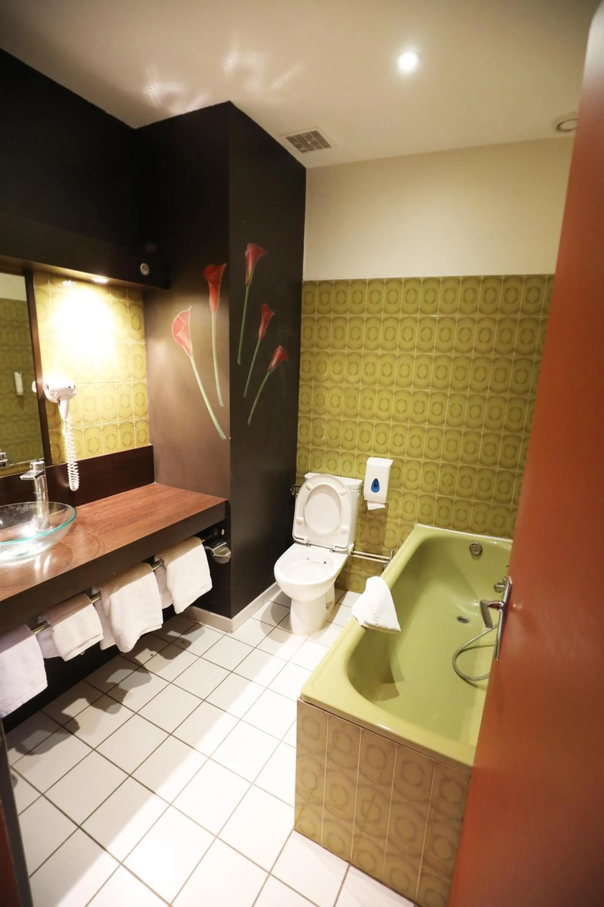 Bathroom in Logis Le Bourguignon