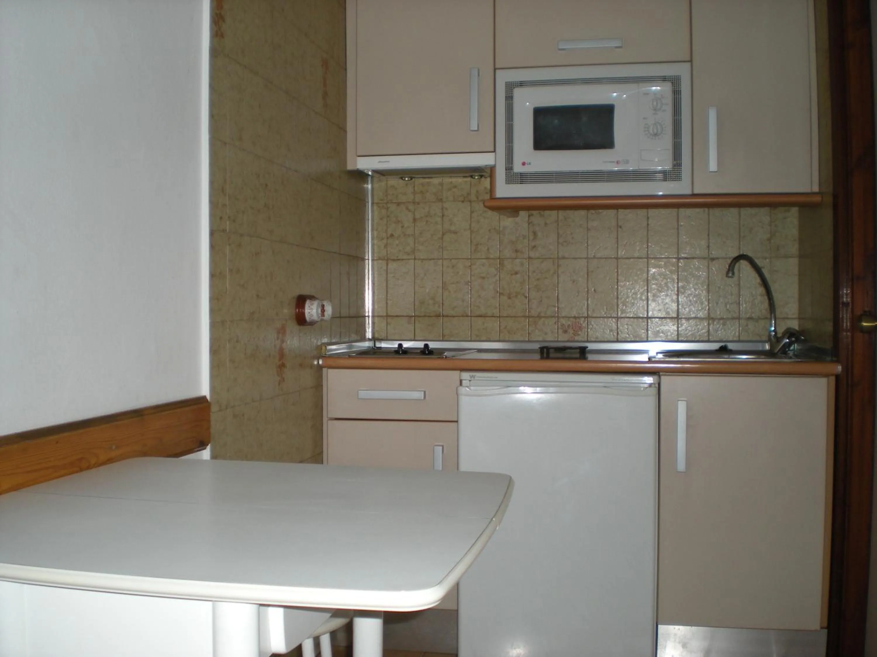 Kitchen or kitchenette in Apartamentos Casanova
