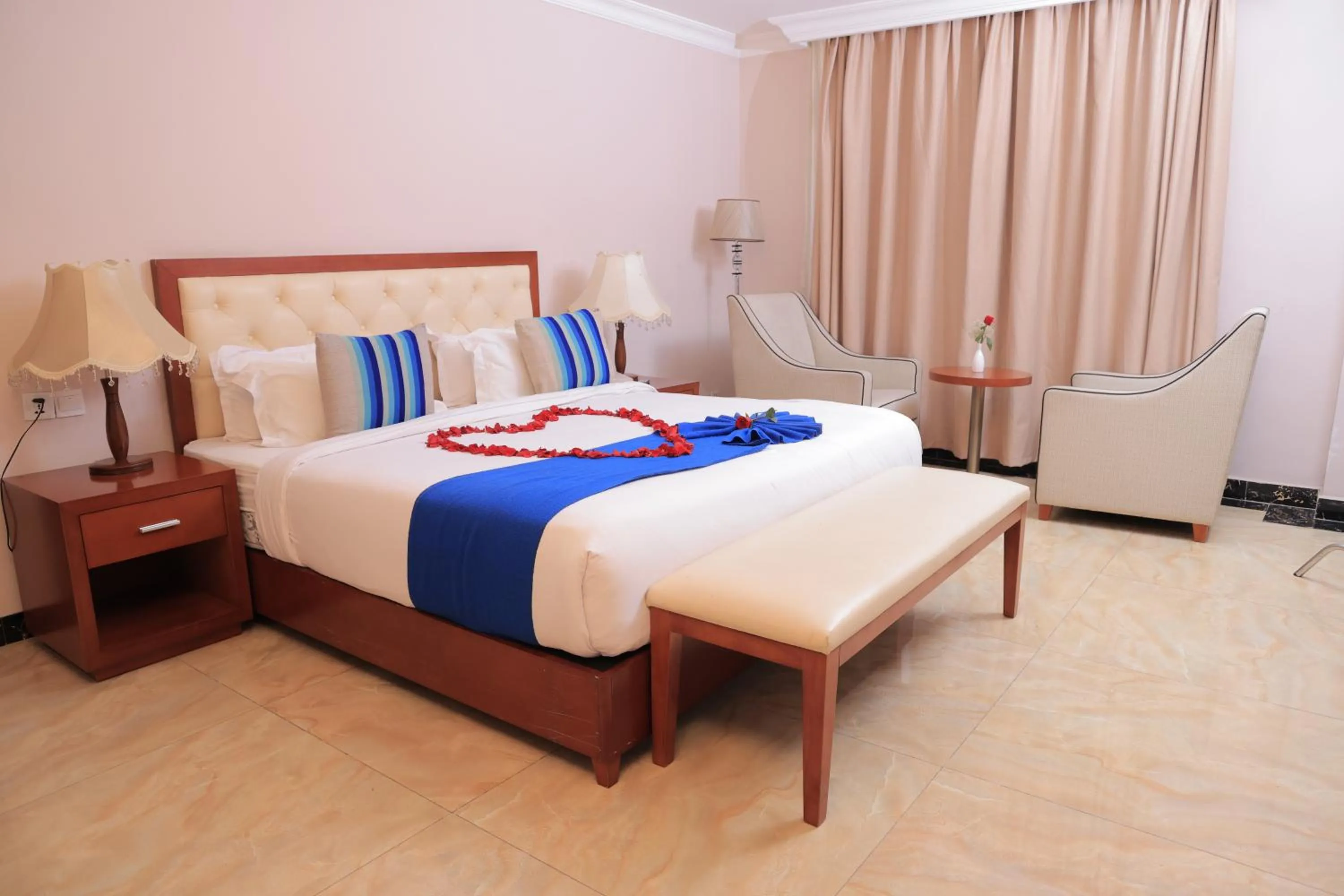 Bed in Tolip Olympia Hotel