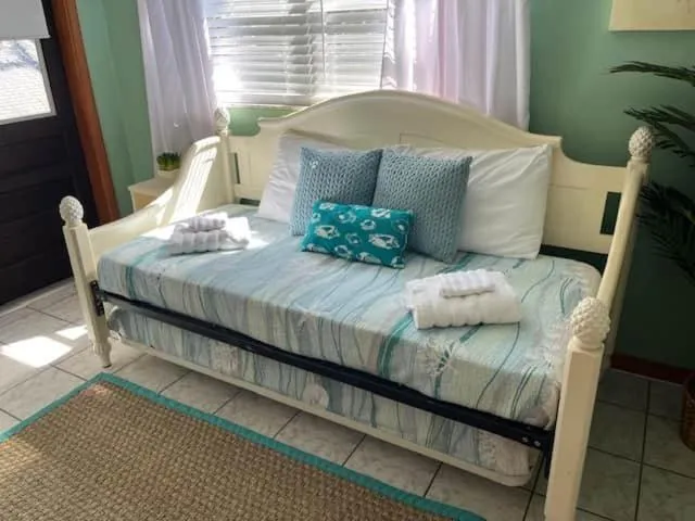 Bed in BeachTrail Lodging