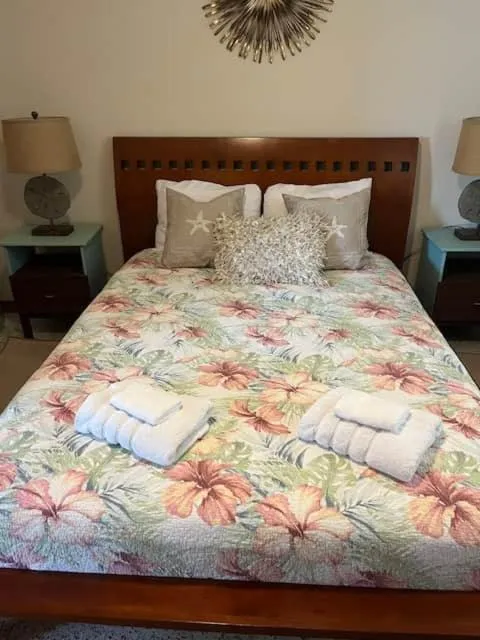 Bed in BeachTrail Lodging