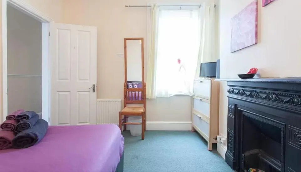 Bed in Home2Home-Rooms