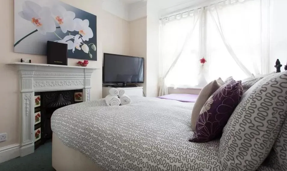 Bed in Home2Home-Rooms