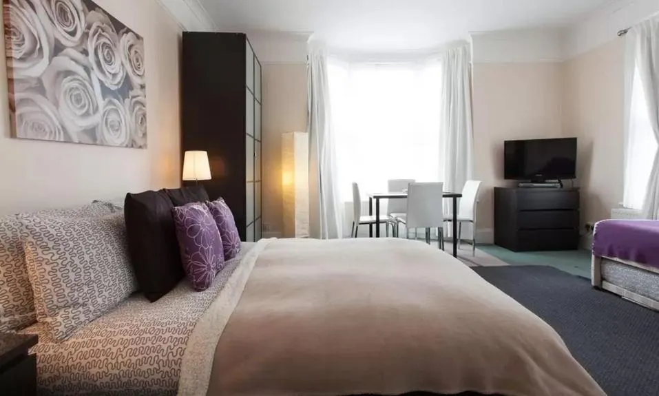 Bed in Home2Home-Rooms