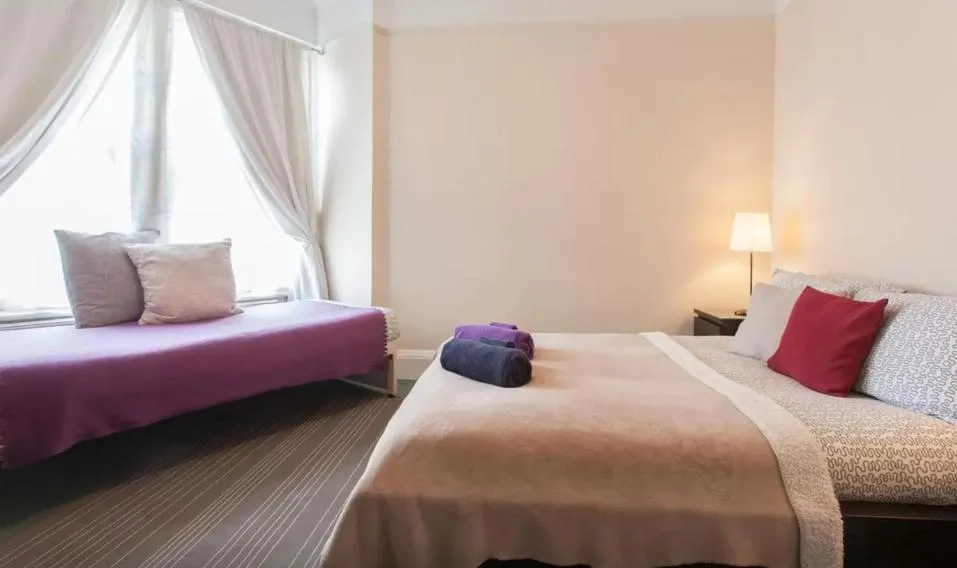 Bed in Home2Home-Rooms