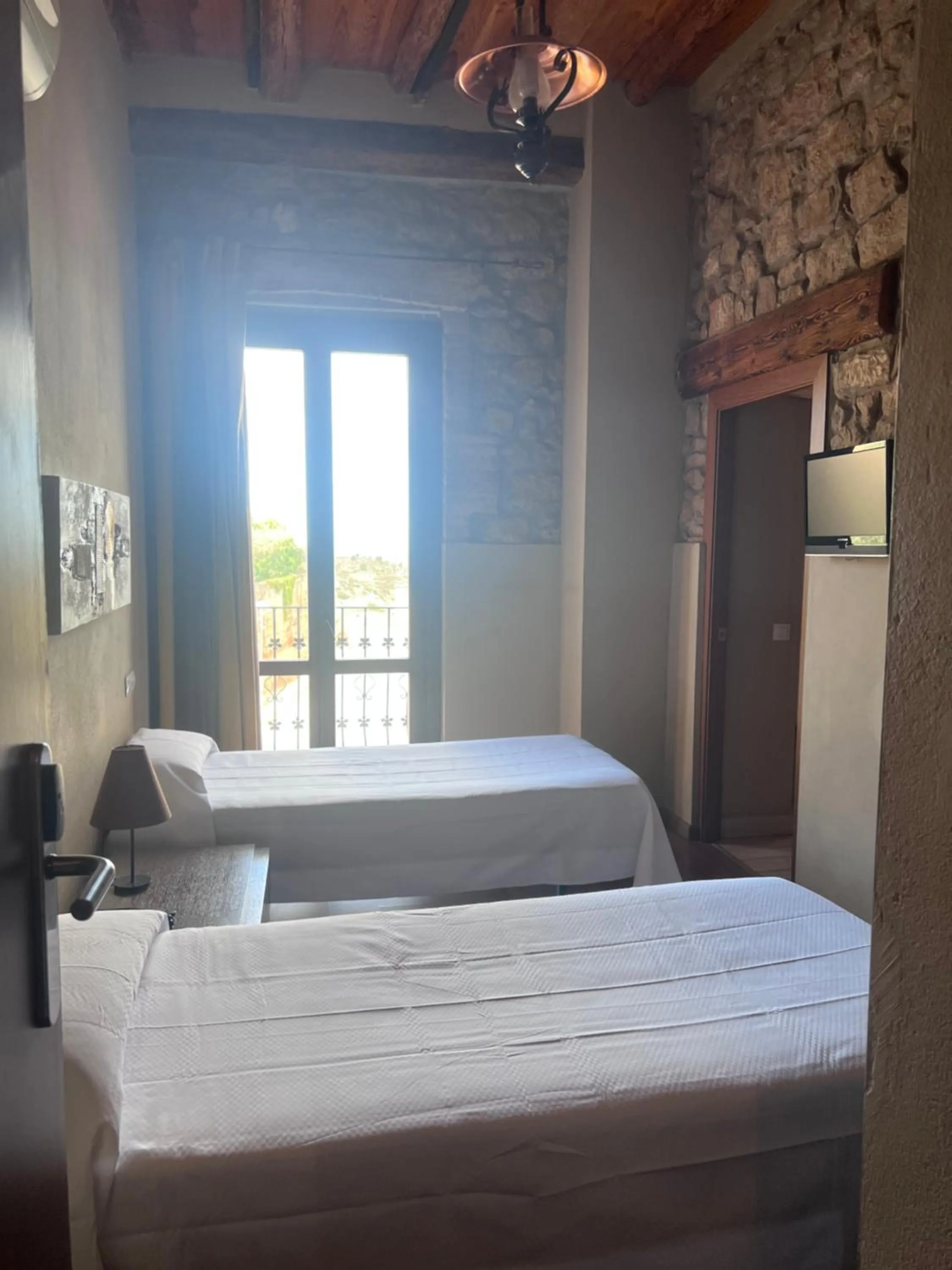 Bed in La Garbinada Hotel