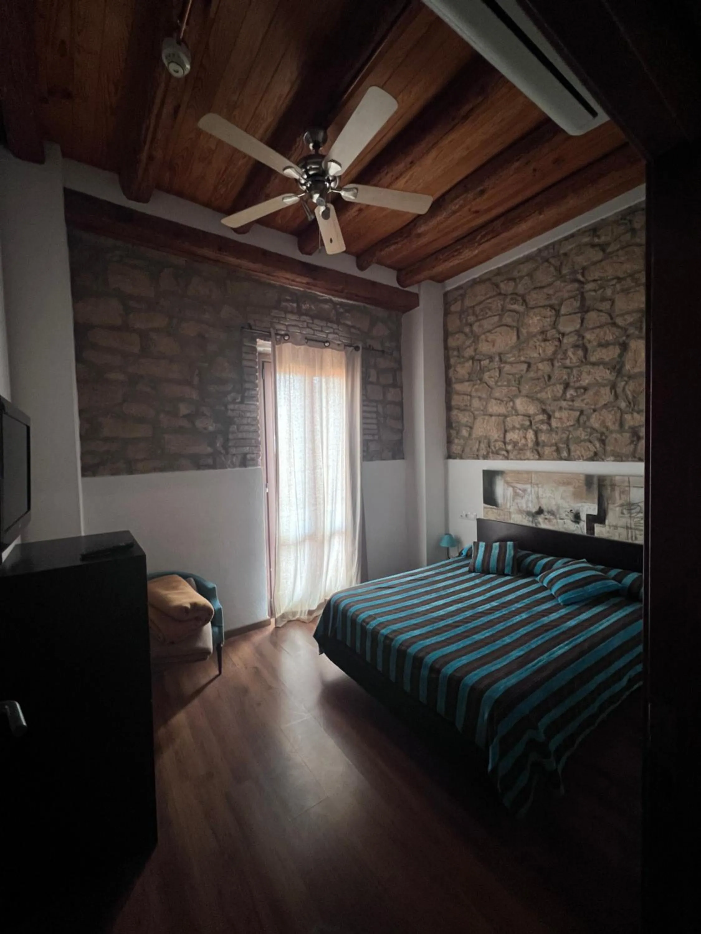 Bed in La Garbinada Hotel