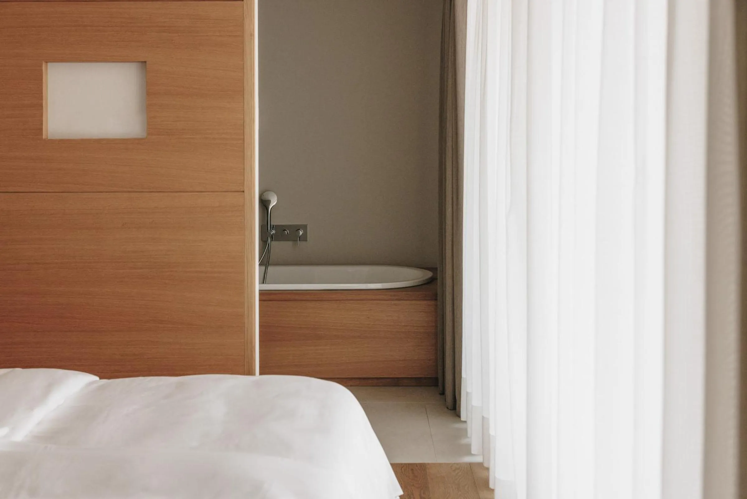 Bed in Hotel Schwarzschmied, a Member of Design Hotels