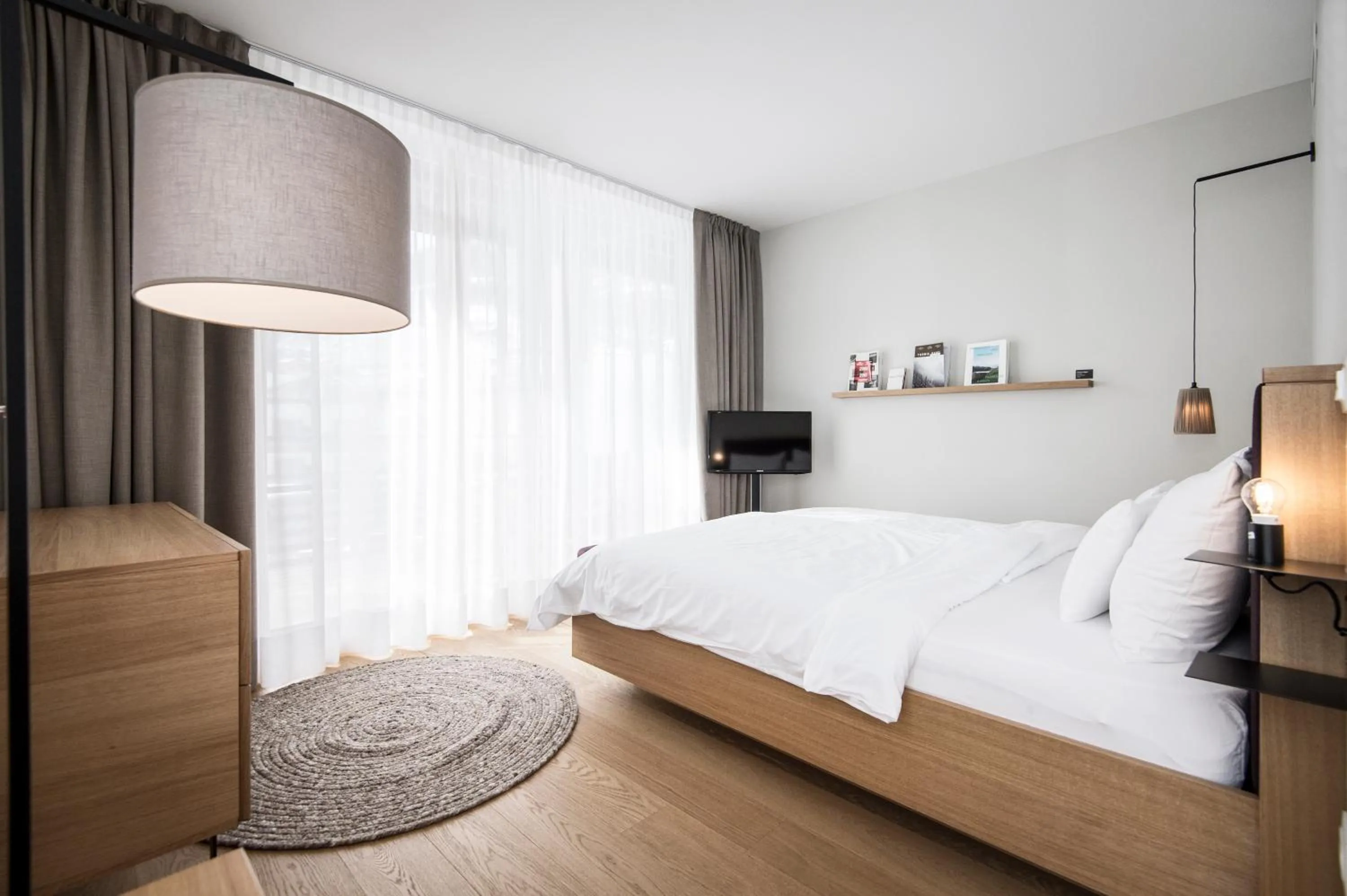 Bed in Hotel Schwarzschmied, a Member of Design Hotels