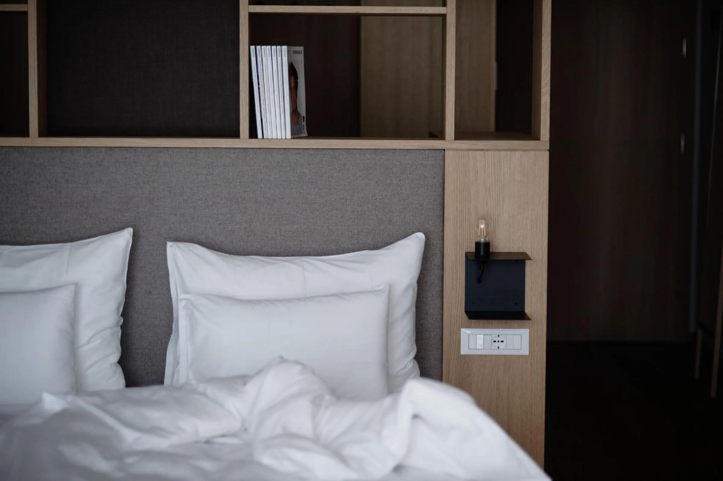 Bed in Hotel Schwarzschmied, a Member of Design Hotels