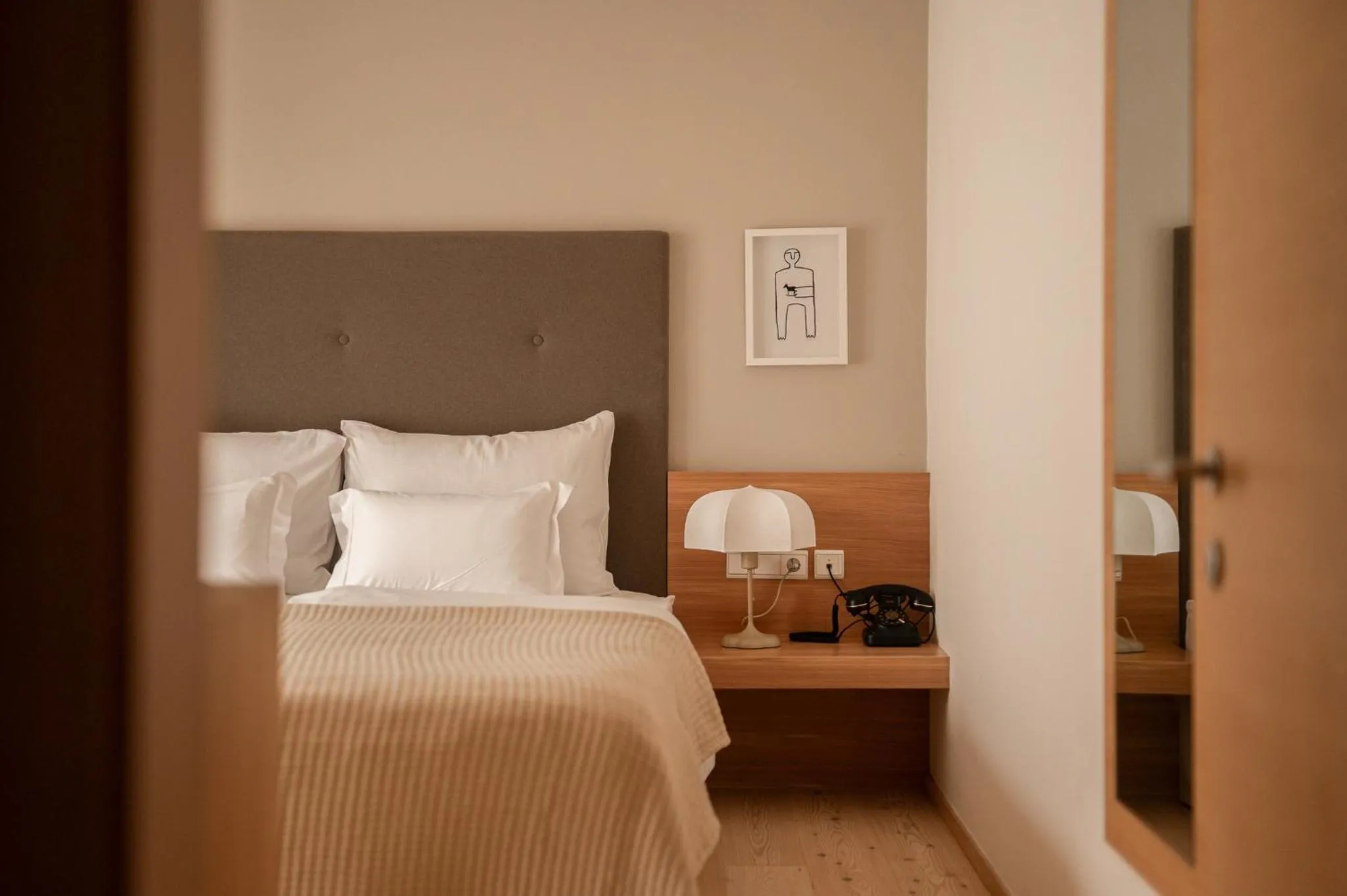 Bed in Hotel Schwarzschmied, a Member of Design Hotels
