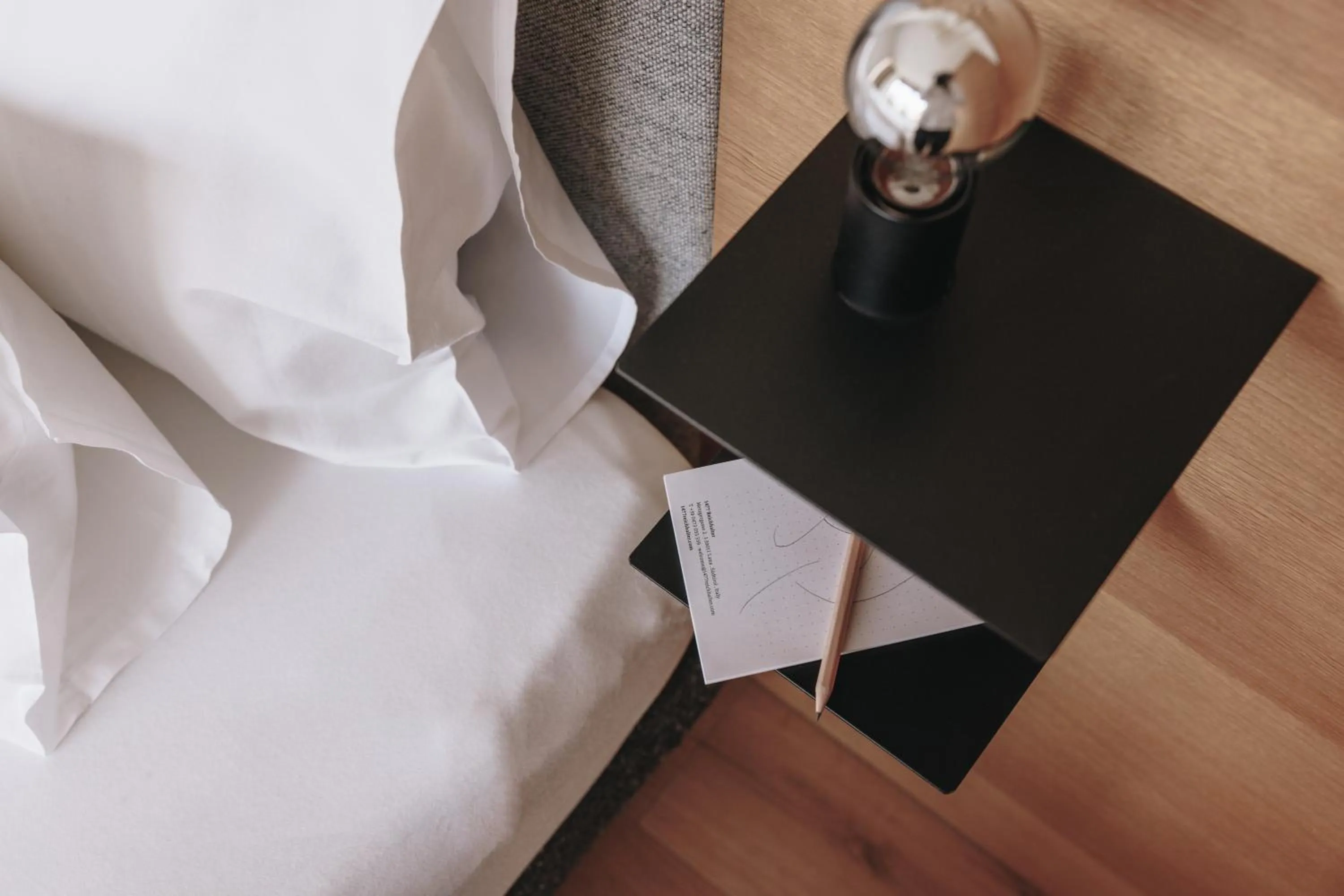 Bed in Hotel Schwarzschmied, a Member of Design Hotels