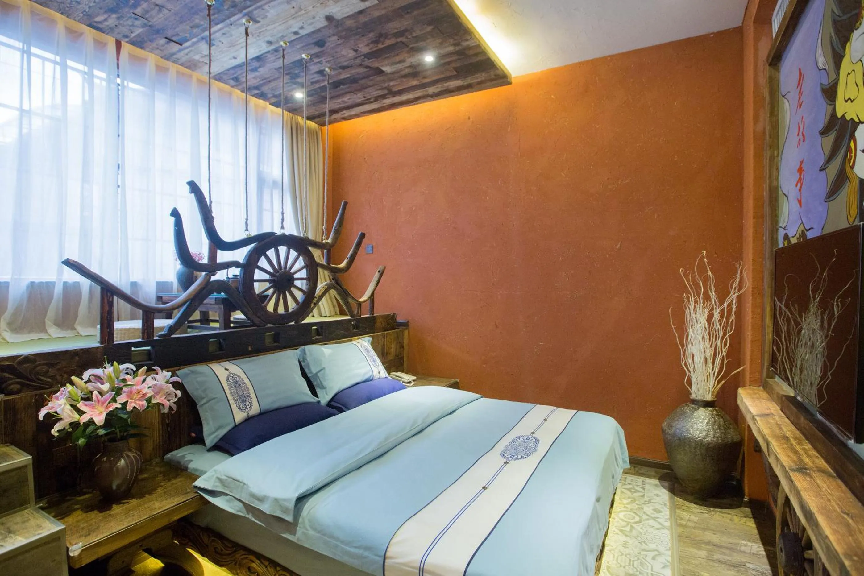 Photo of the whole room, Bed in Old Story Inn Lijiang Old Town