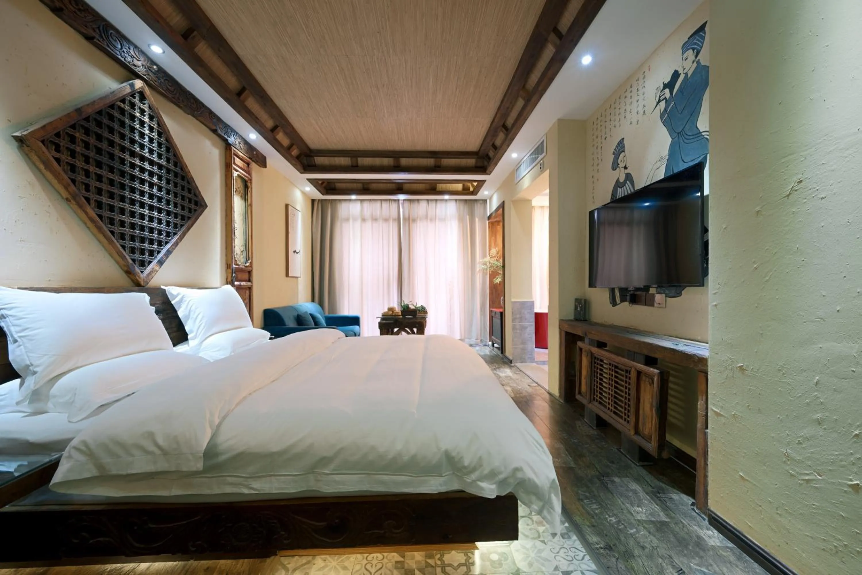 Photo of the whole room, Bed in Old Story Inn Lijiang Old Town