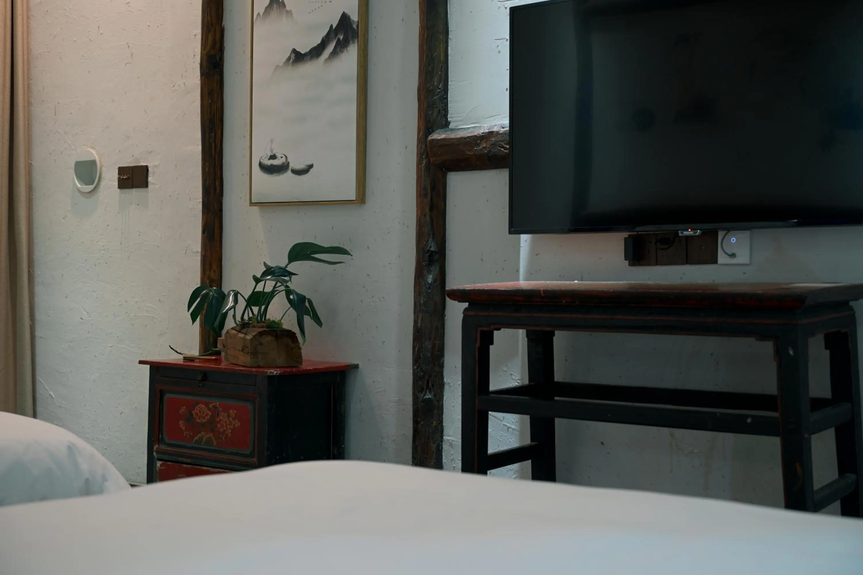 Bed in Old Story Inn Lijiang Old Town