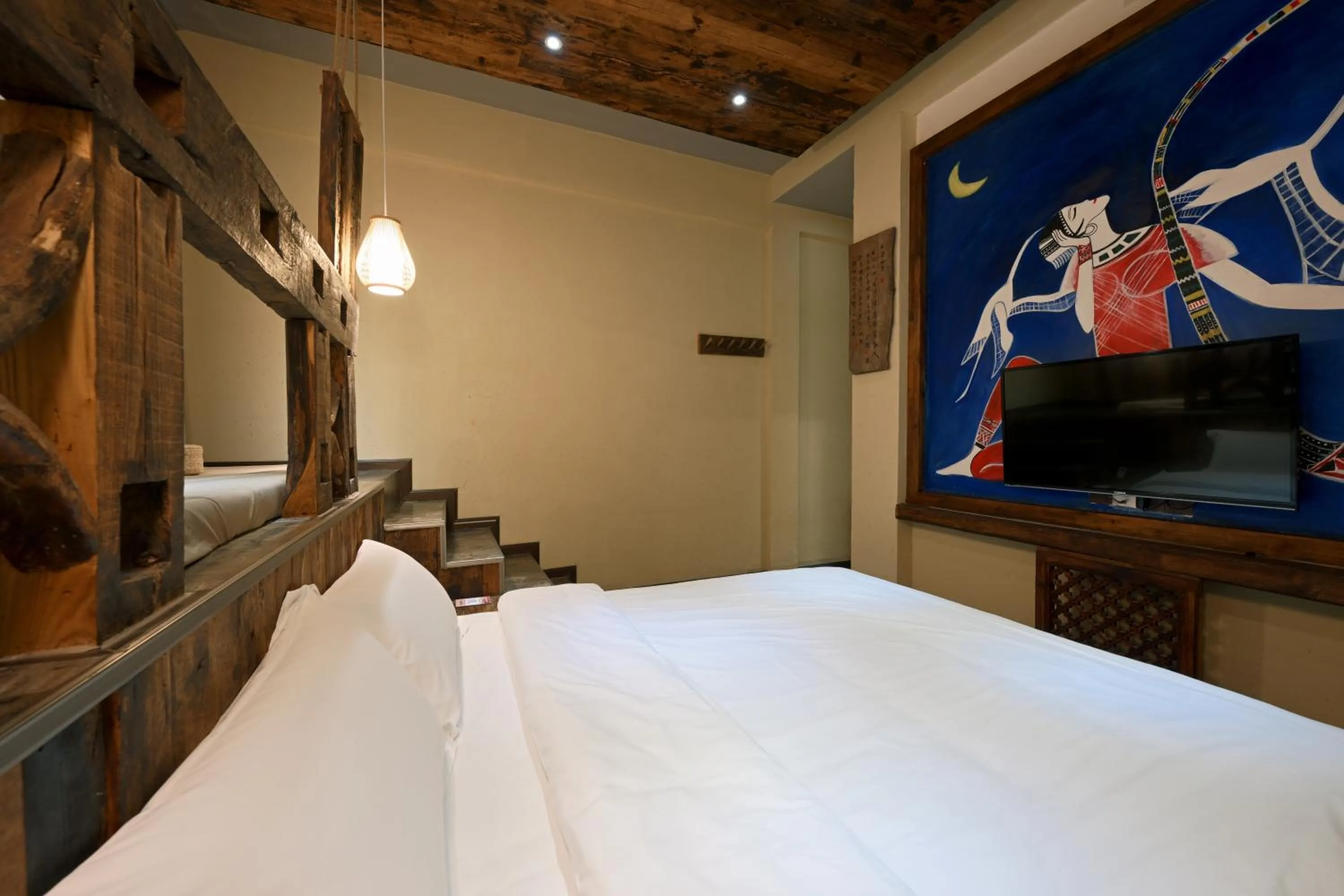 Bed in Old Story Inn Lijiang Old Town