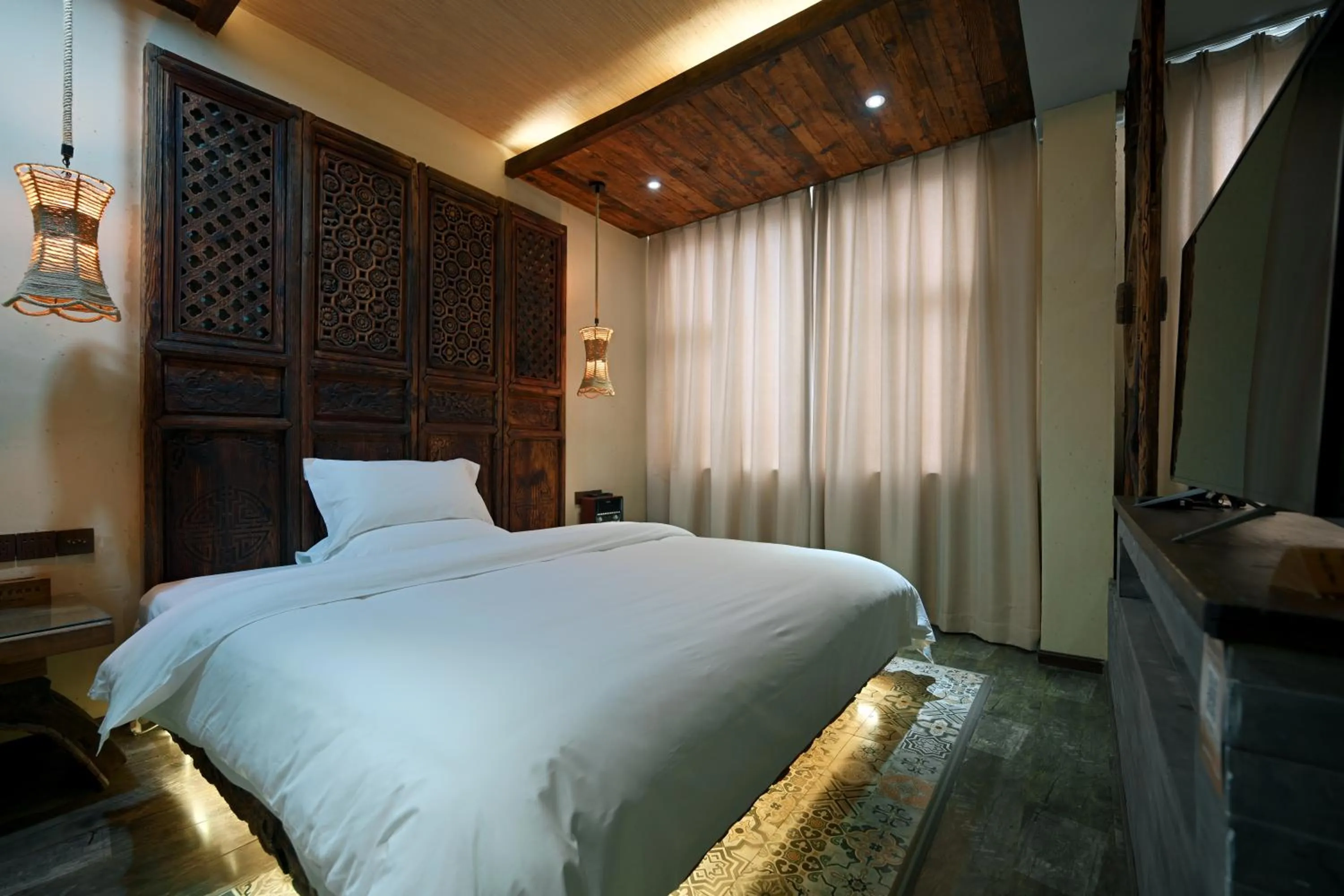 Bed in Old Story Inn Lijiang Old Town