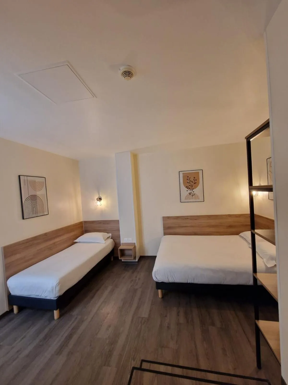 Bed in Hôtel D'Anjou