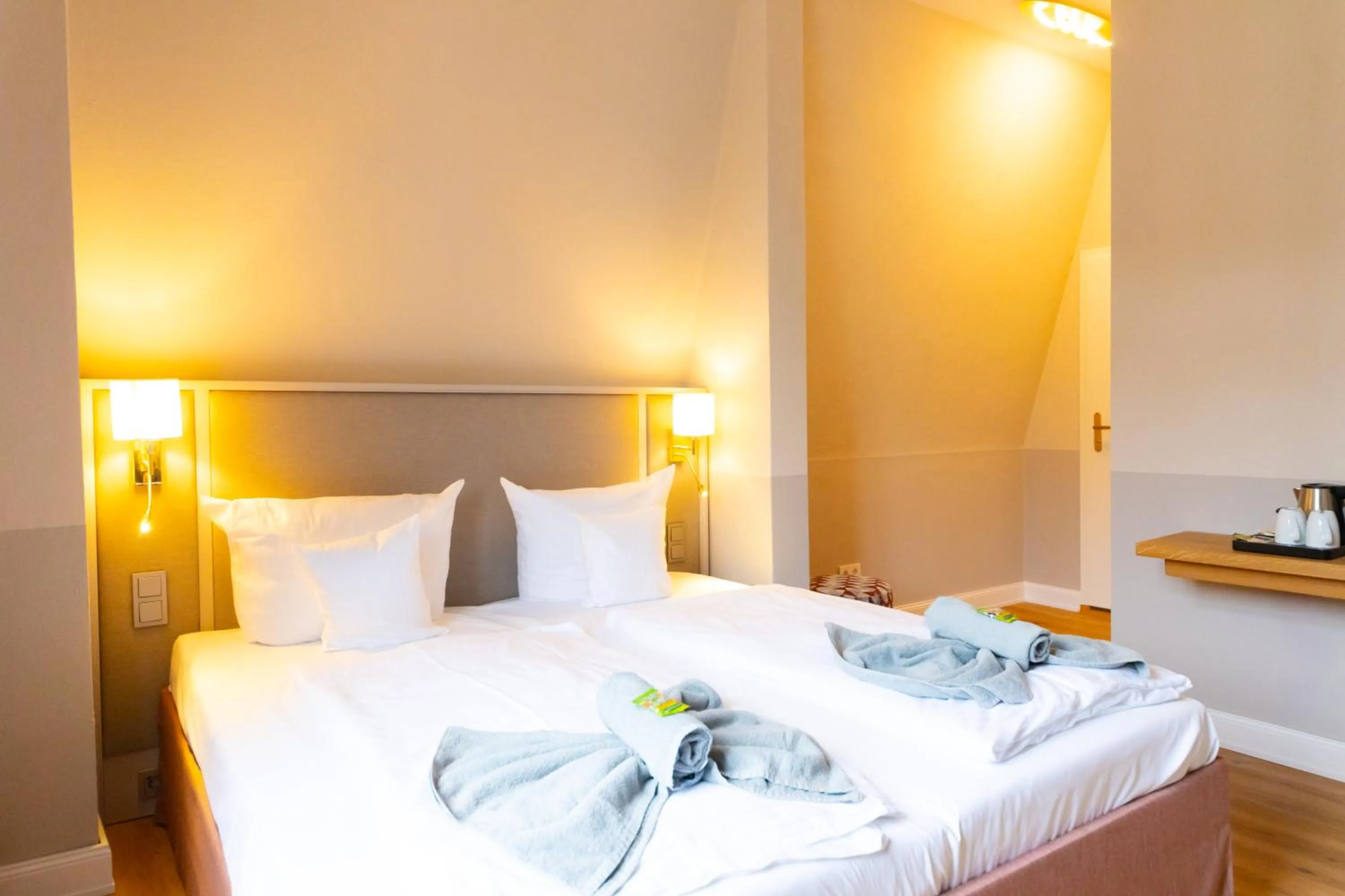 Bed in Hotel Germania